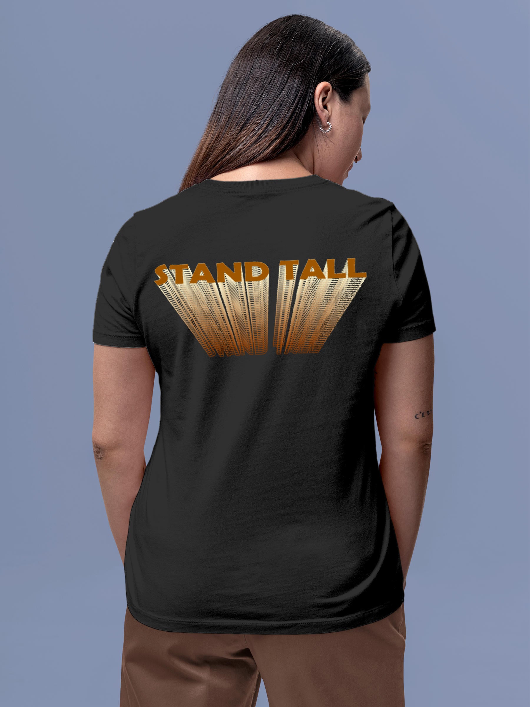 Model wearing Women's Dark Grey Round Neck T-shirt with 'Stand Tall' design, offering effortless style and premium comfort