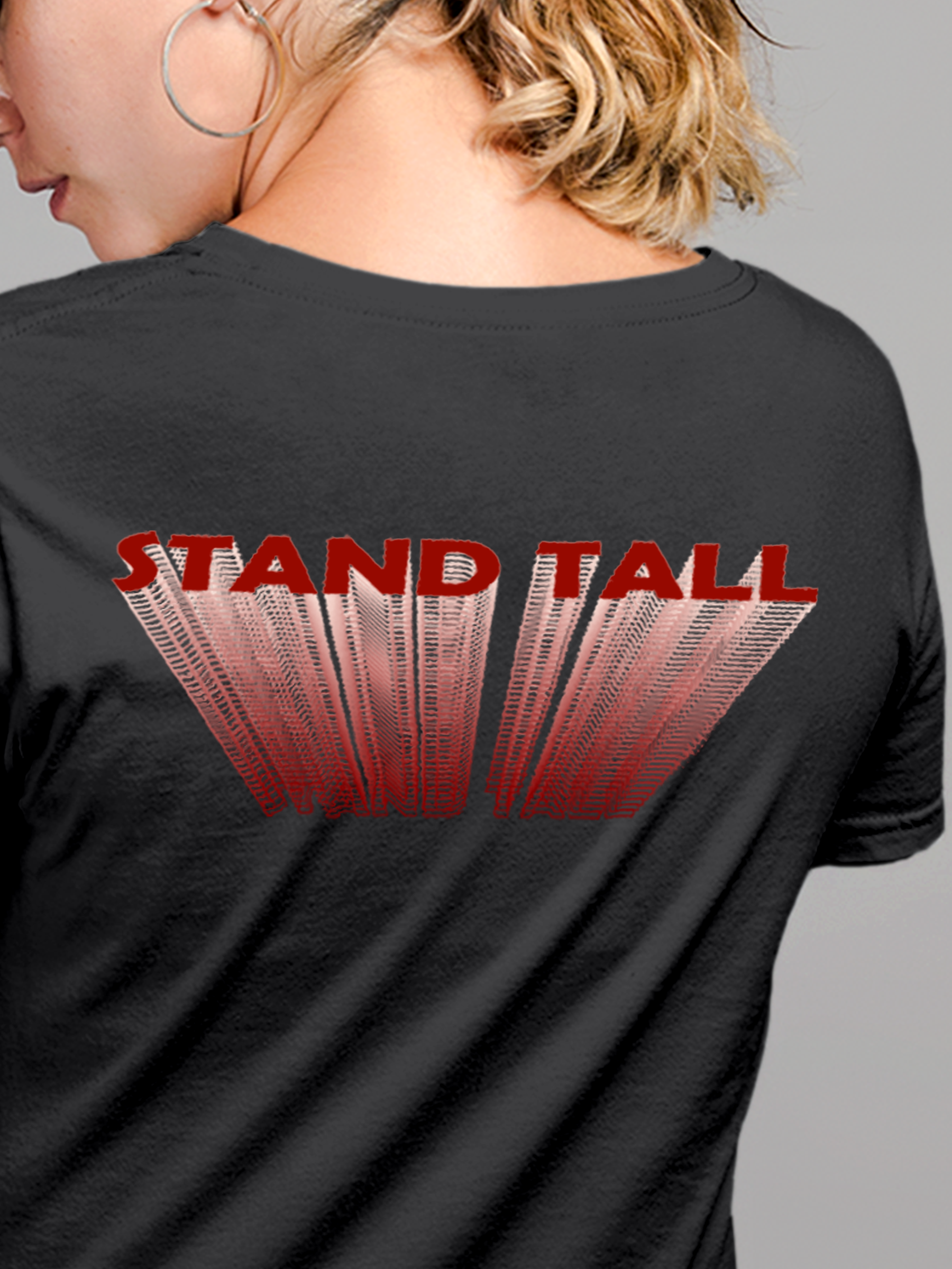 Close up of 'Stand Tall' design on Women's Dark Grey Round Neck T-shirt, highlighting intricate details and vibrant print.