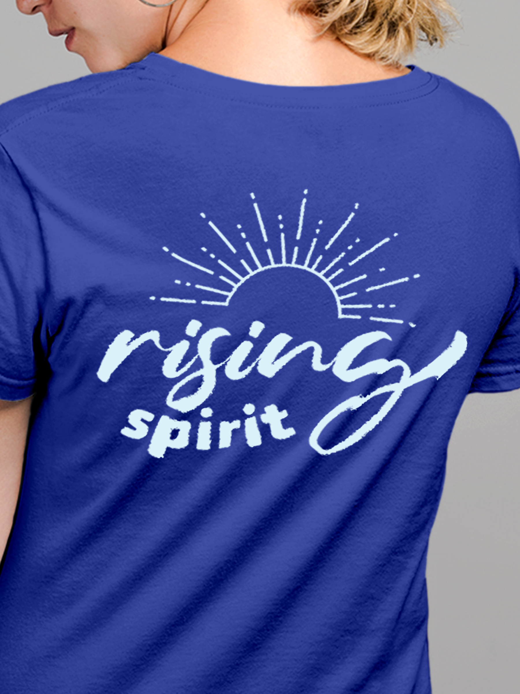 Close up of 'Rising Spirit' design on Women's Blue Round Neck T-shirt, highlighting intricate details and vibrant print.
