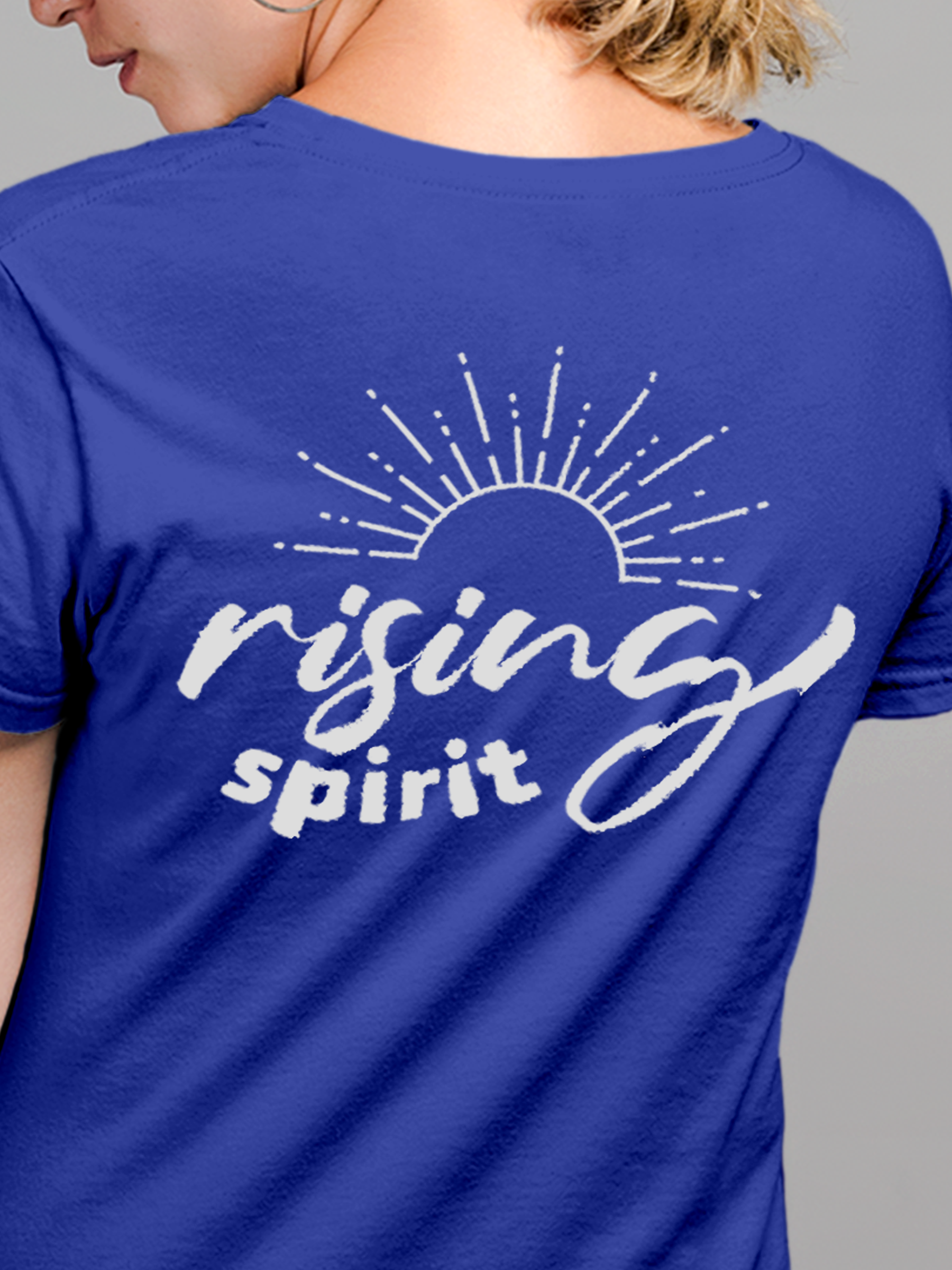Close up of 'Rising Spirit' design on Women's Blue Round Neck T-shirt, highlighting intricate details and vibrant print.