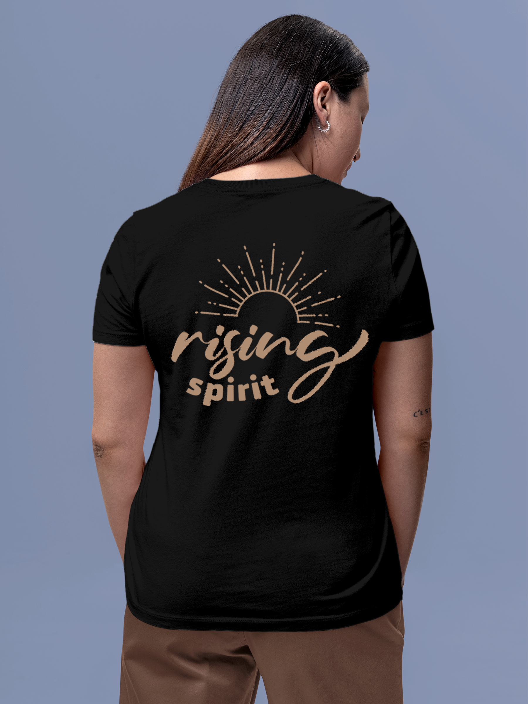 Model wearing Women's Black Round Neck T-shirt with 'Rising Spirit' design, offering effortless style and premium comfort
