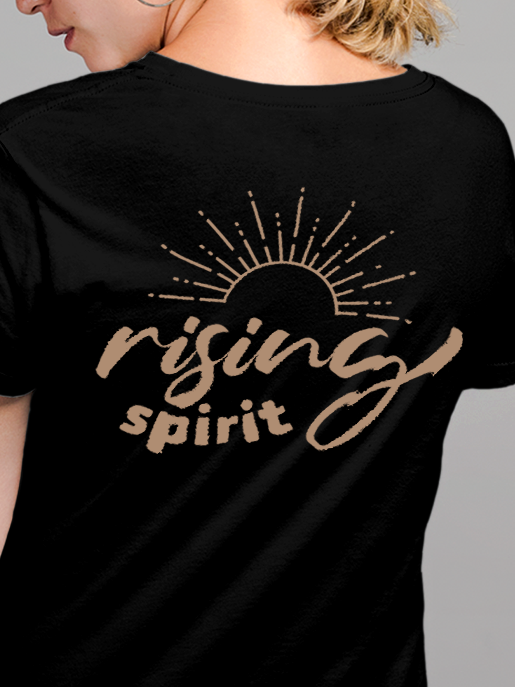 Close up of 'Rising Spirit' design on Women's Black Round Neck T-shirt, highlighting intricate details and vibrant print.
