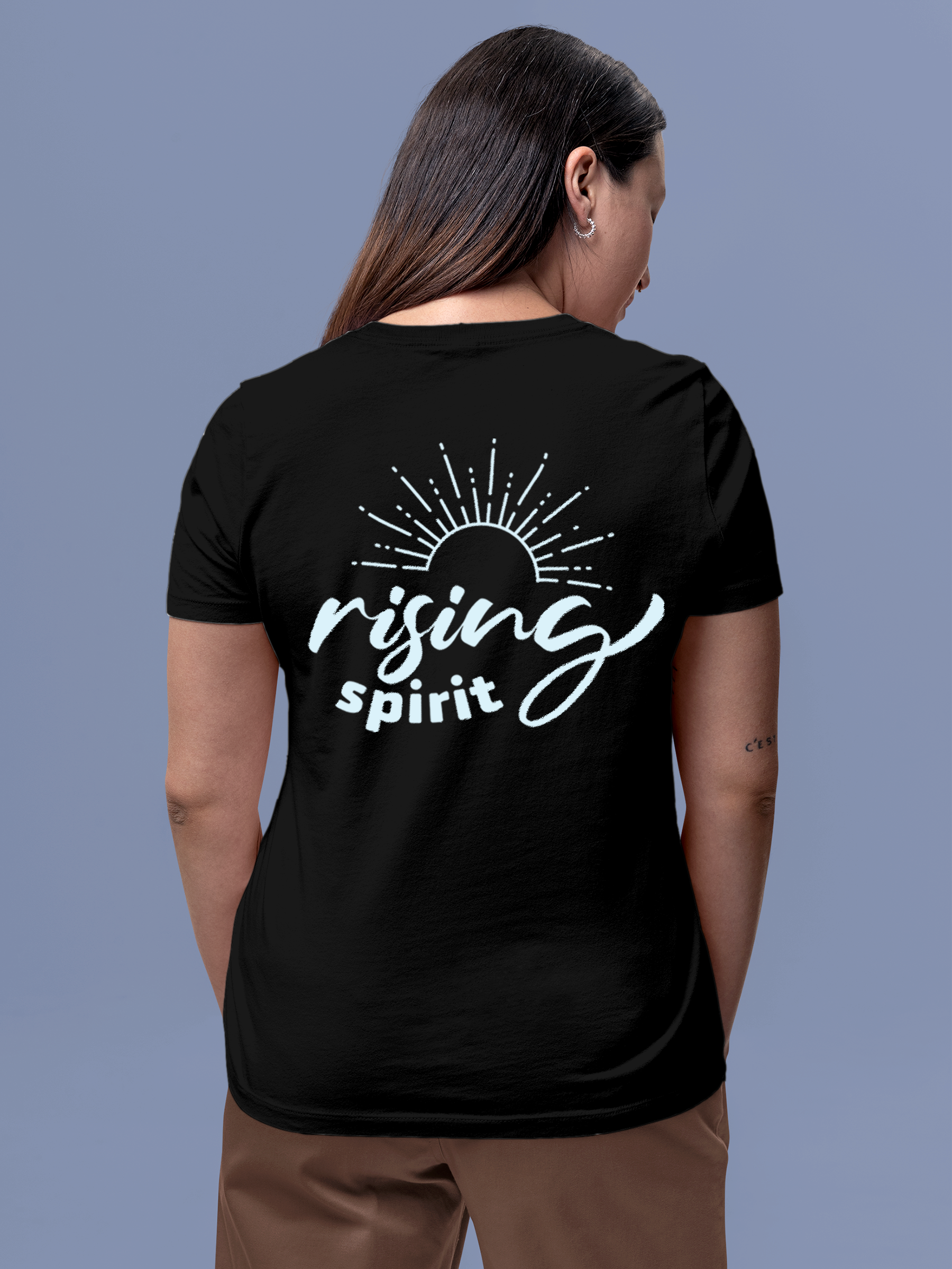 Model wearing Women's Black Round Neck T-shirt with 'Rising Spirit' design, offering effortless style and premium comfort