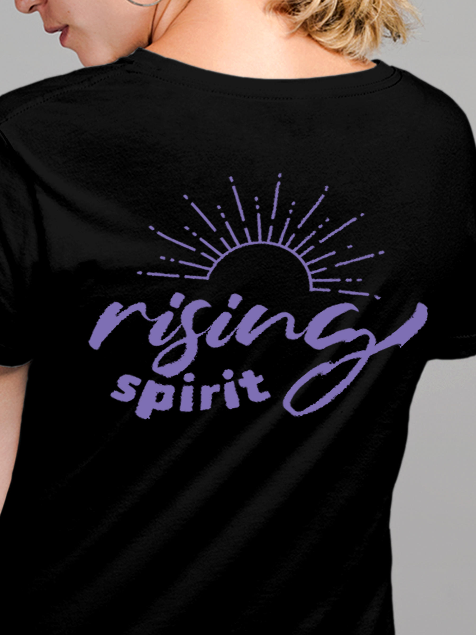 Close up of 'Rising Spirit' design on Women's Black Round Neck T-shirt, highlighting intricate details and vibrant print.