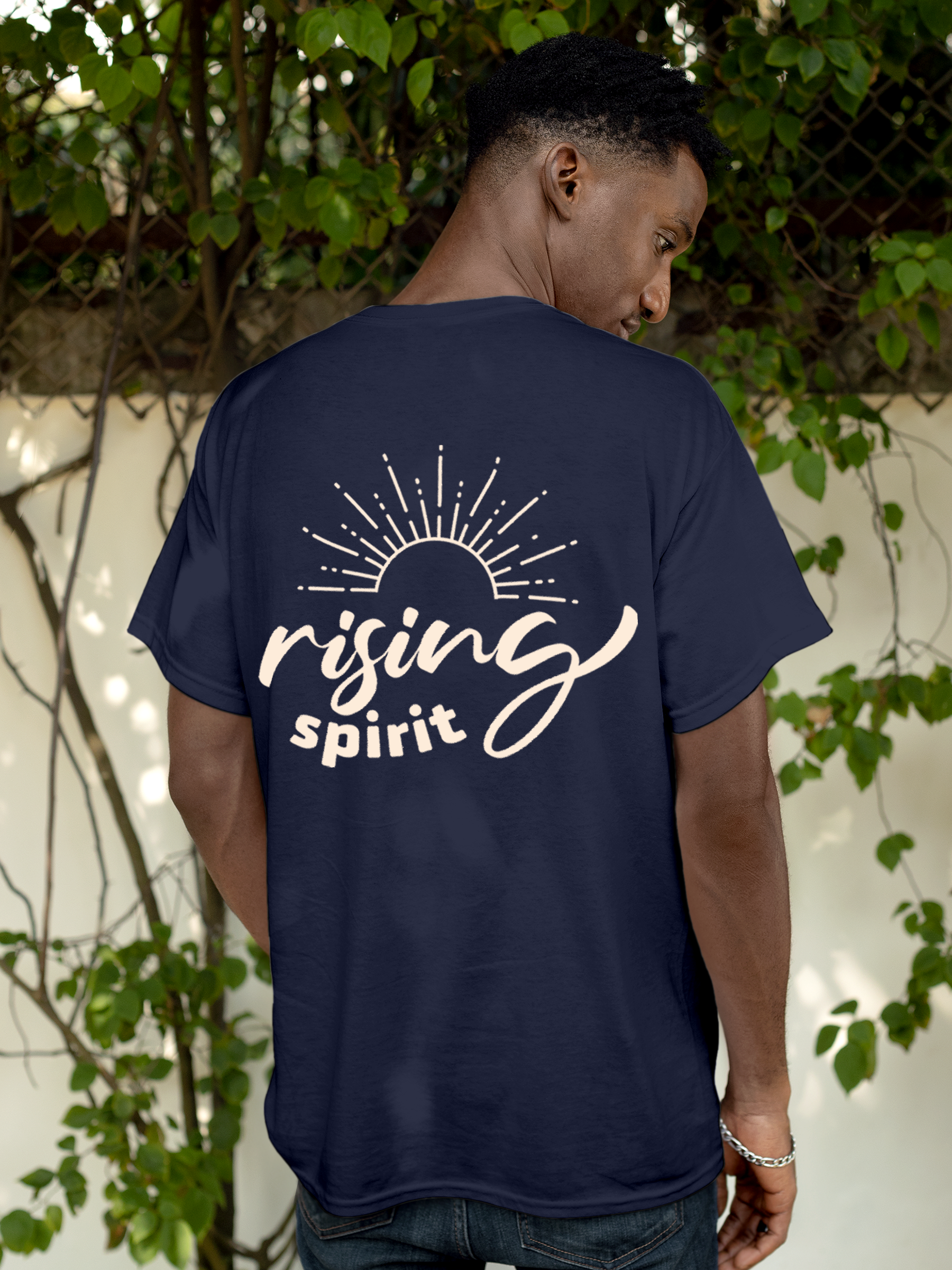 Model wearing Men's Navy Blue Round Neck T-shirt with 'Rising Spirit' design, offering effortless style and premium comfort
