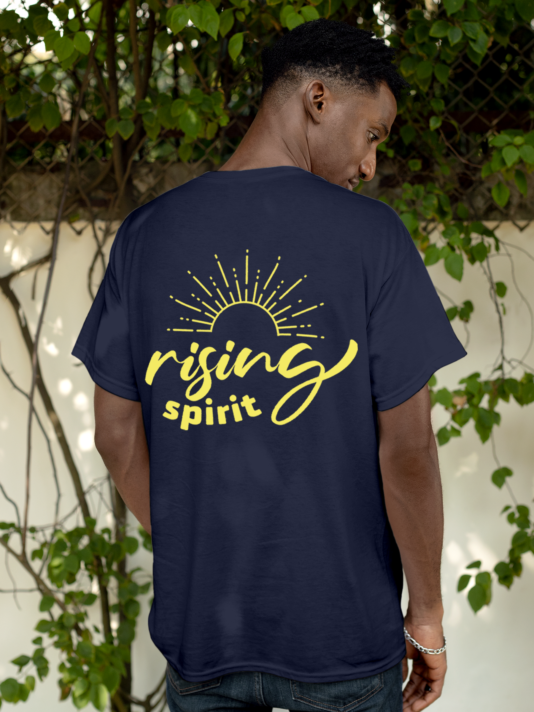 Model wearing Men's Navy Blue Round Neck T-shirt with 'Rising Spirit' design, offering effortless style and premium comfort