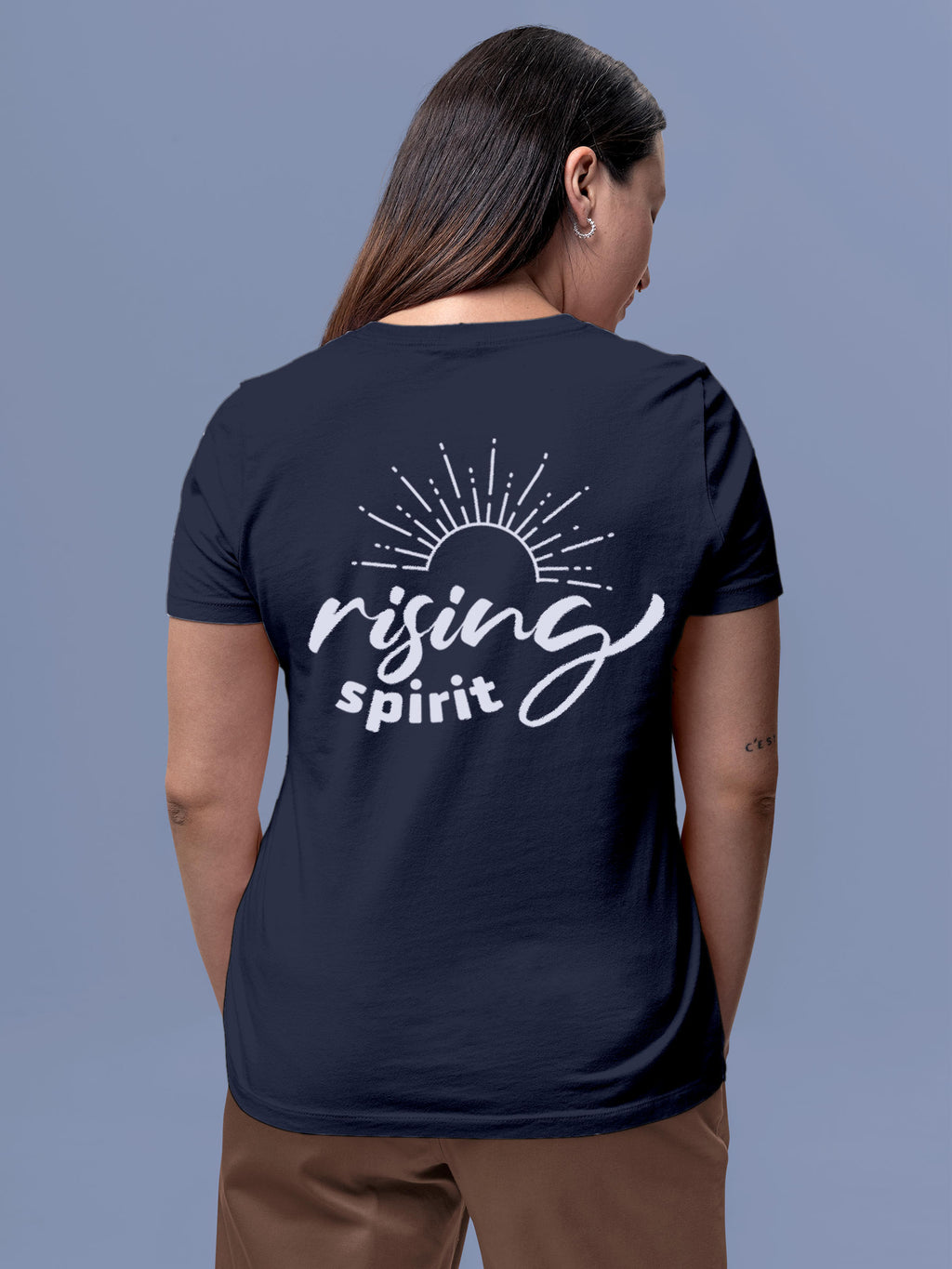 Model wearing Women's Navy Blue Round Neck T-shirt with 'Rising Spirit' design, offering effortless style and premium comfort