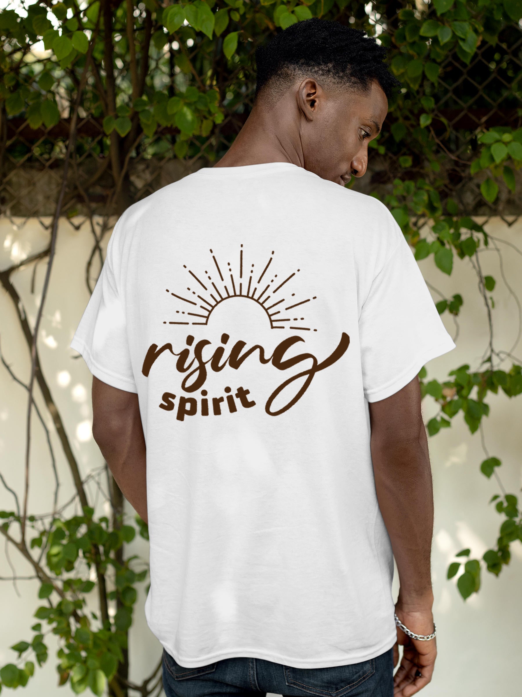 Model wearing Men's White Round Neck T-shirt with 'Rising Spirit' design, offering effortless style and premium comfort