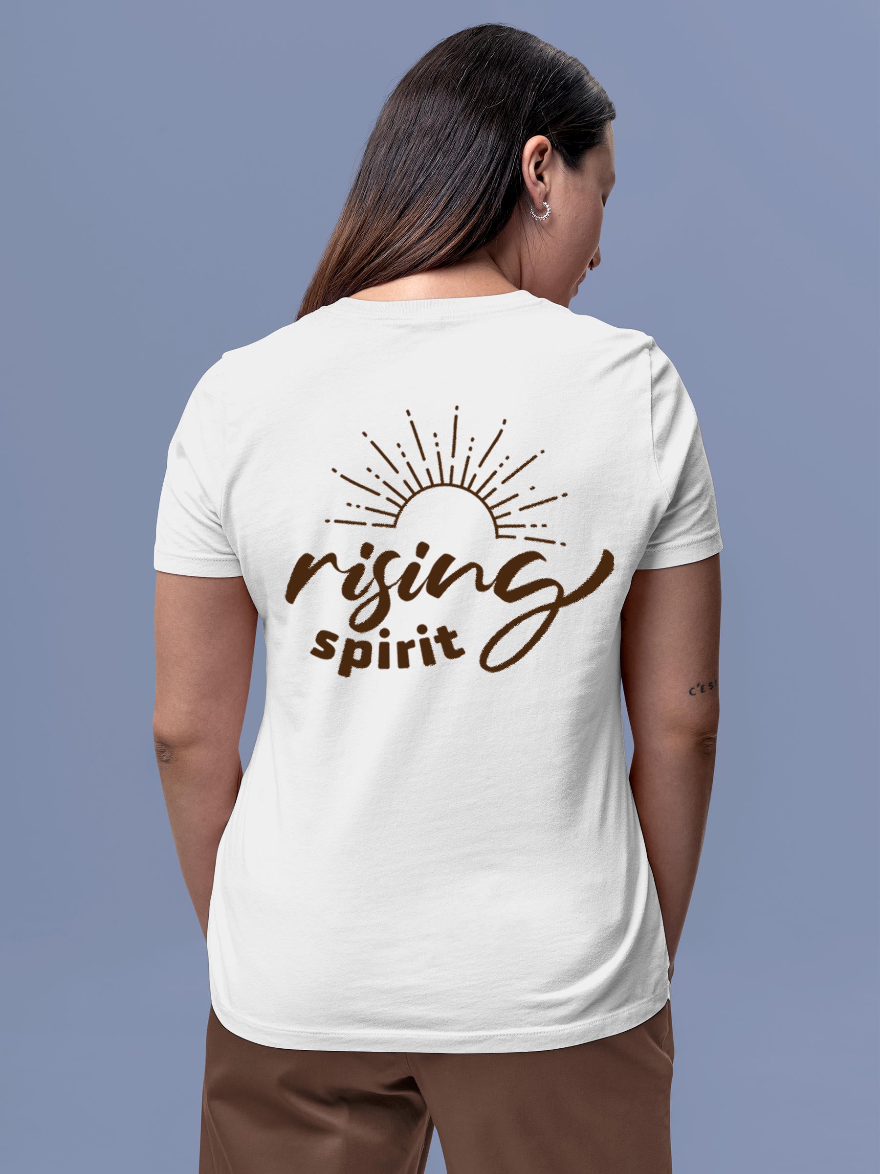 Model wearing Women's White Round Neck T-shirt with 'Rising Spirit' design, offering effortless style and premium comfort