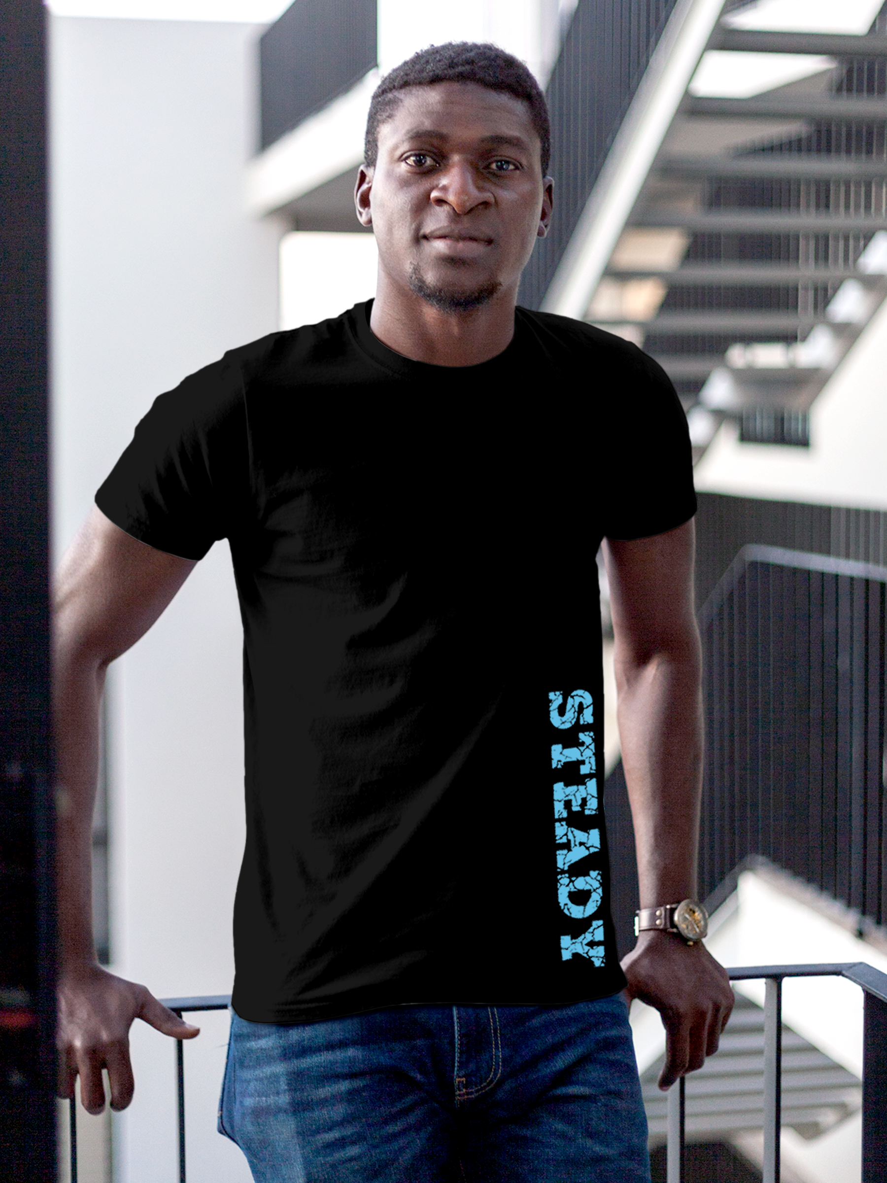 Model wearing Men's Black Round Neck T-shirt with 'Steady' design, offering effortless style and premium comfort