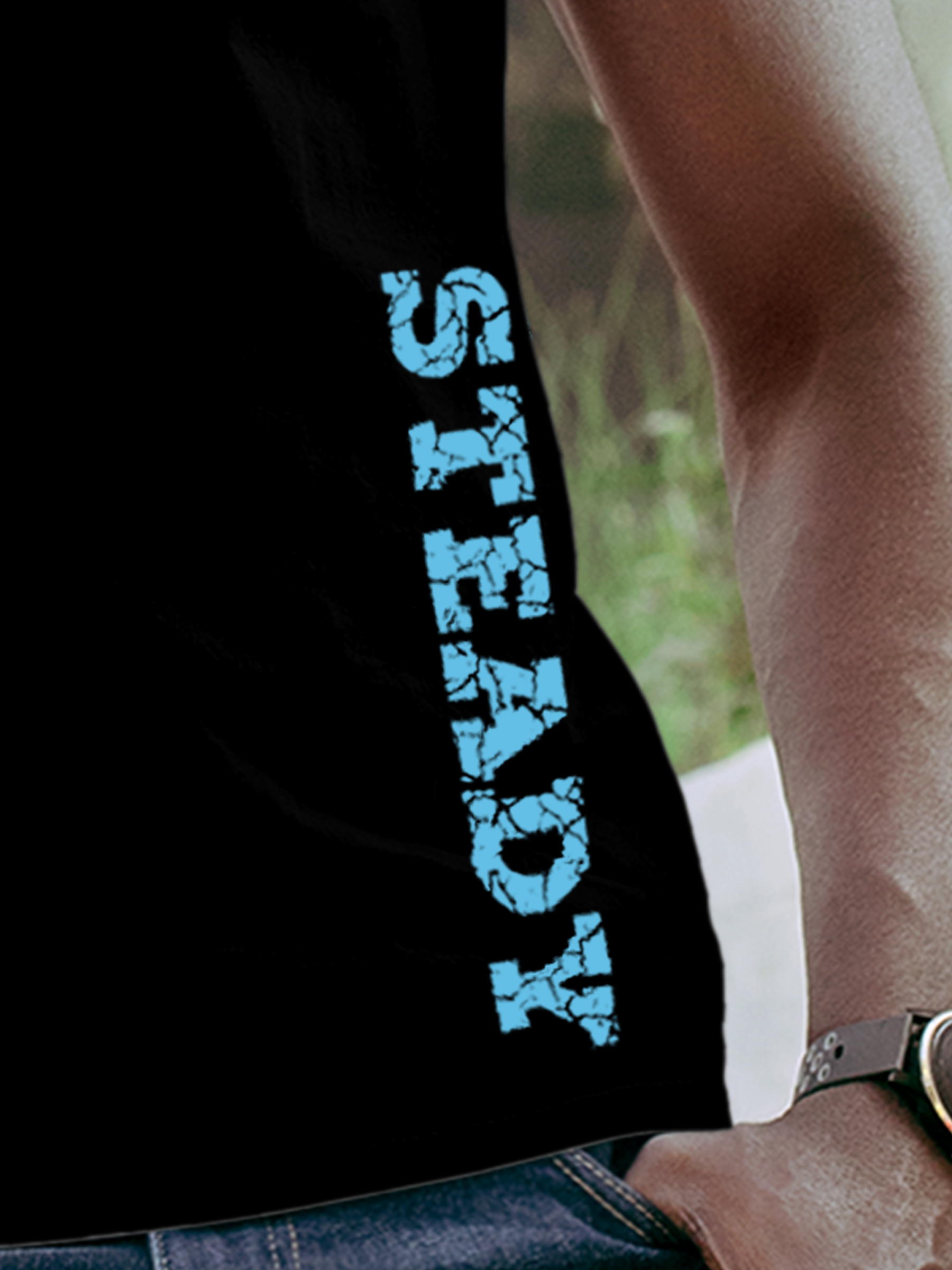Close up of 'Steady' design on Men's Black Round Neck T-shirt, highlighting intricate details and vibrant print.