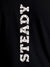Close up of 'Steady' design on Men's Black Round Neck T-shirt, highlighting intricate details and vibrant print.