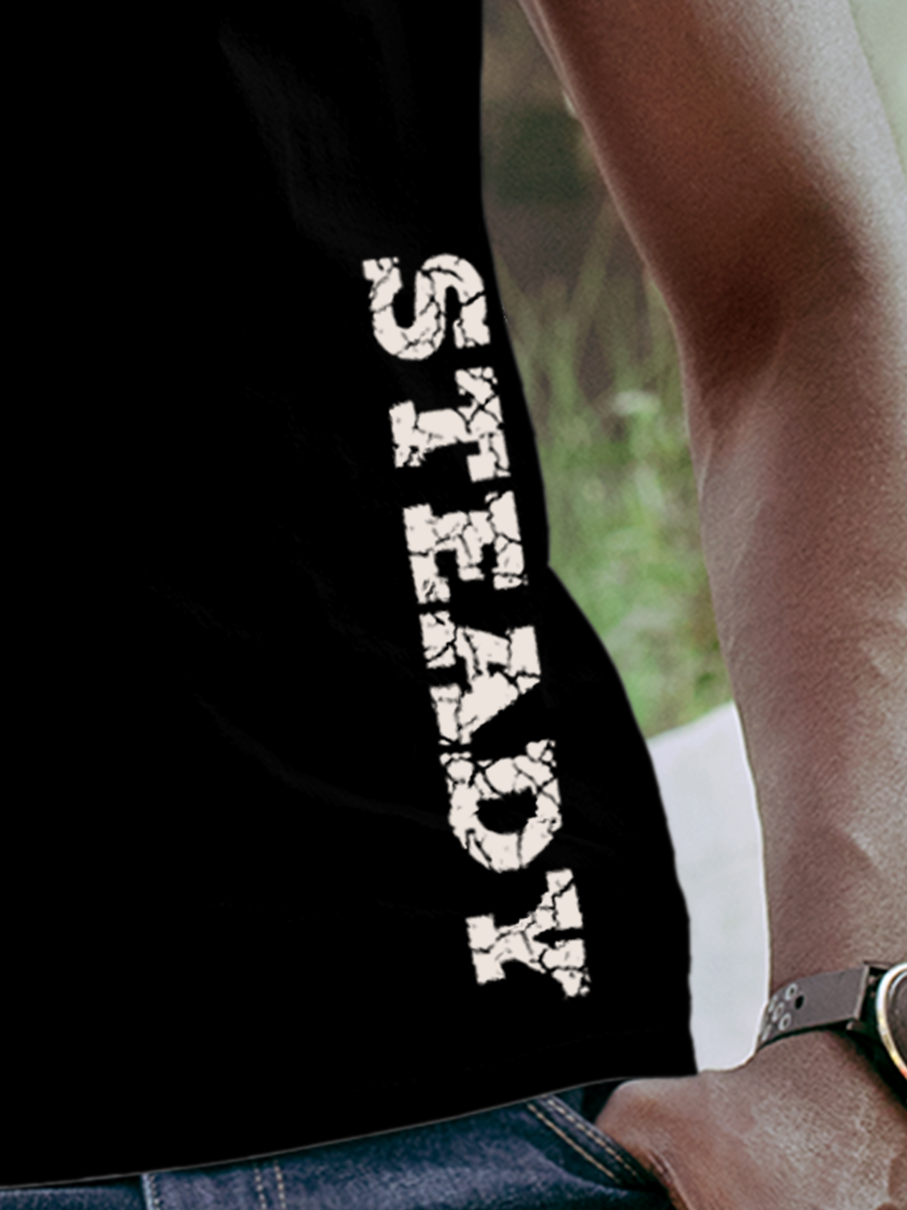 Close up of 'Steady' design on Men's Black Round Neck T-shirt, highlighting intricate details and vibrant print.