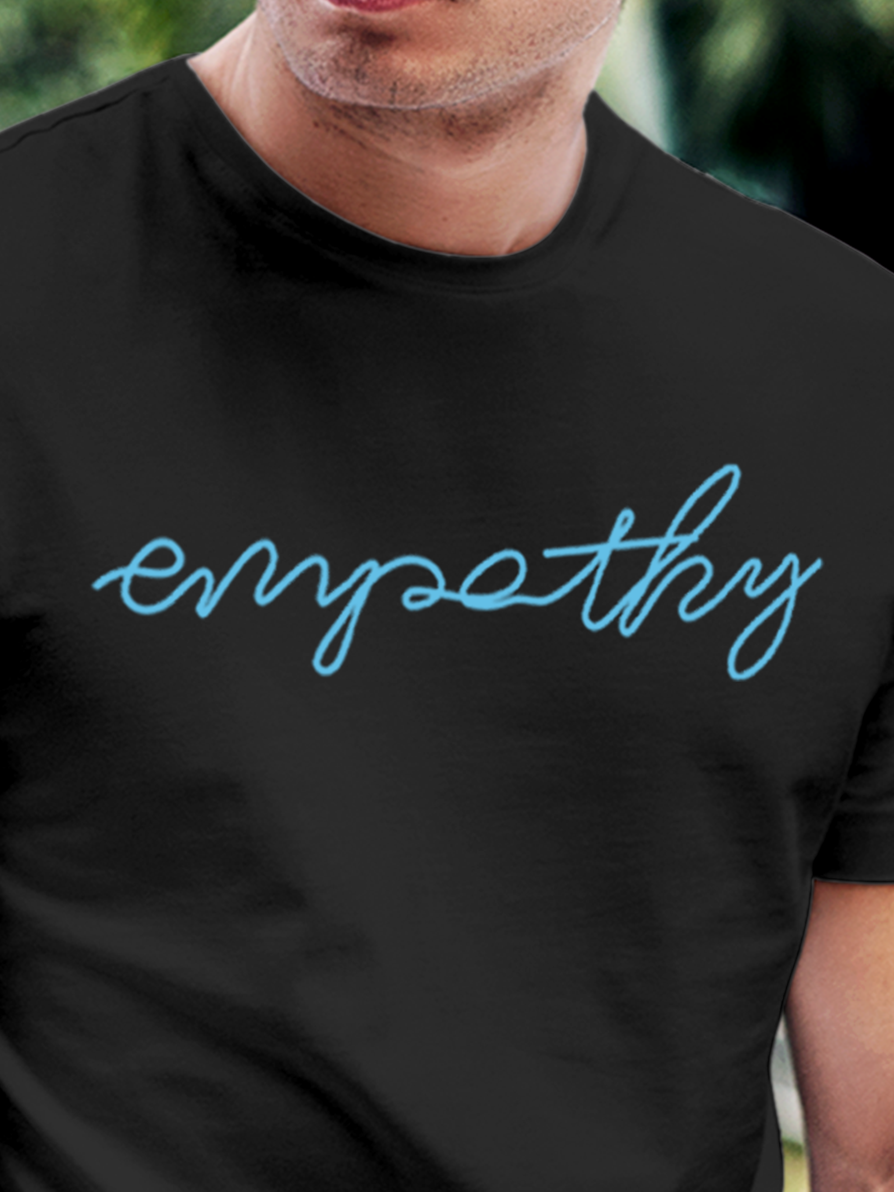 Close up of 'Empathy' design on Men's Charcoal Grey Round Neck T-shirt, highlighting intricate details and vibrant print.