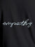 Close up of 'Empathy' design on Women's Dark Grey Round Neck T-shirt, highlighting intricate details and vibrant print.