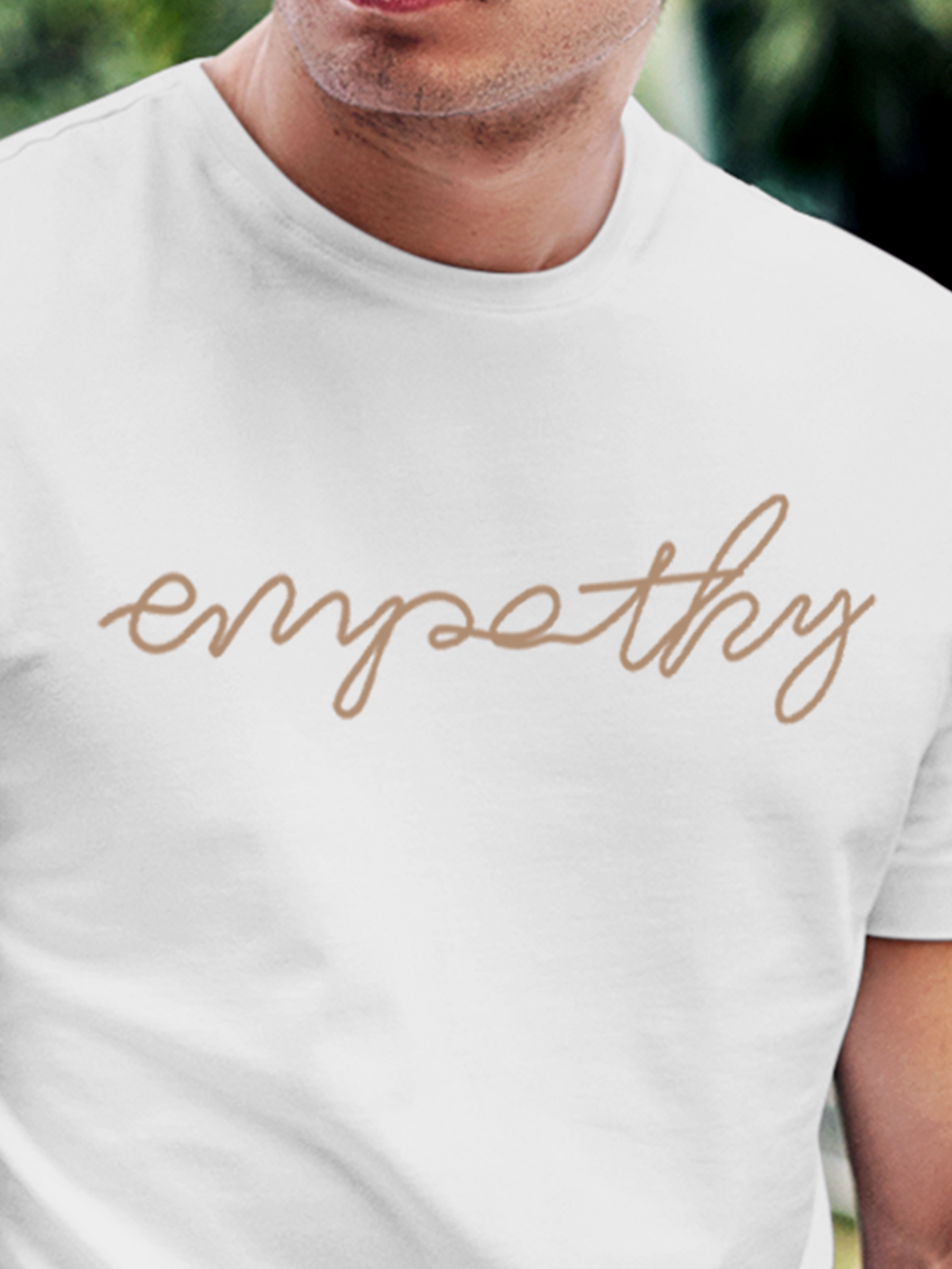 Close up of 'Empathy' design on Men's White Round Neck T-shirt, highlighting intricate details and vibrant print.