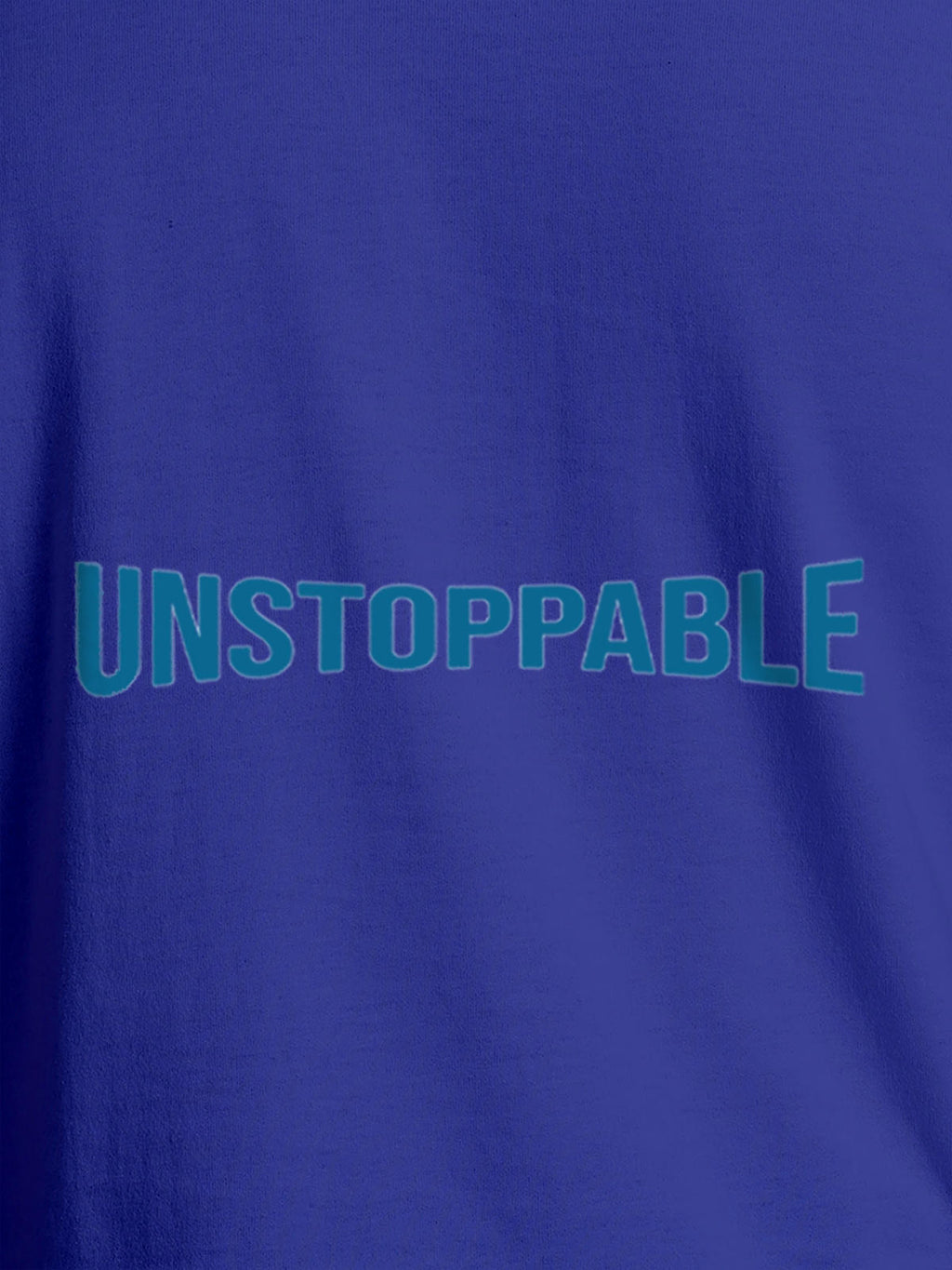 Close up of 'Unstoppable' design on Men's Blue Round Neck T-shirt, highlighting intricate details and vibrant print.