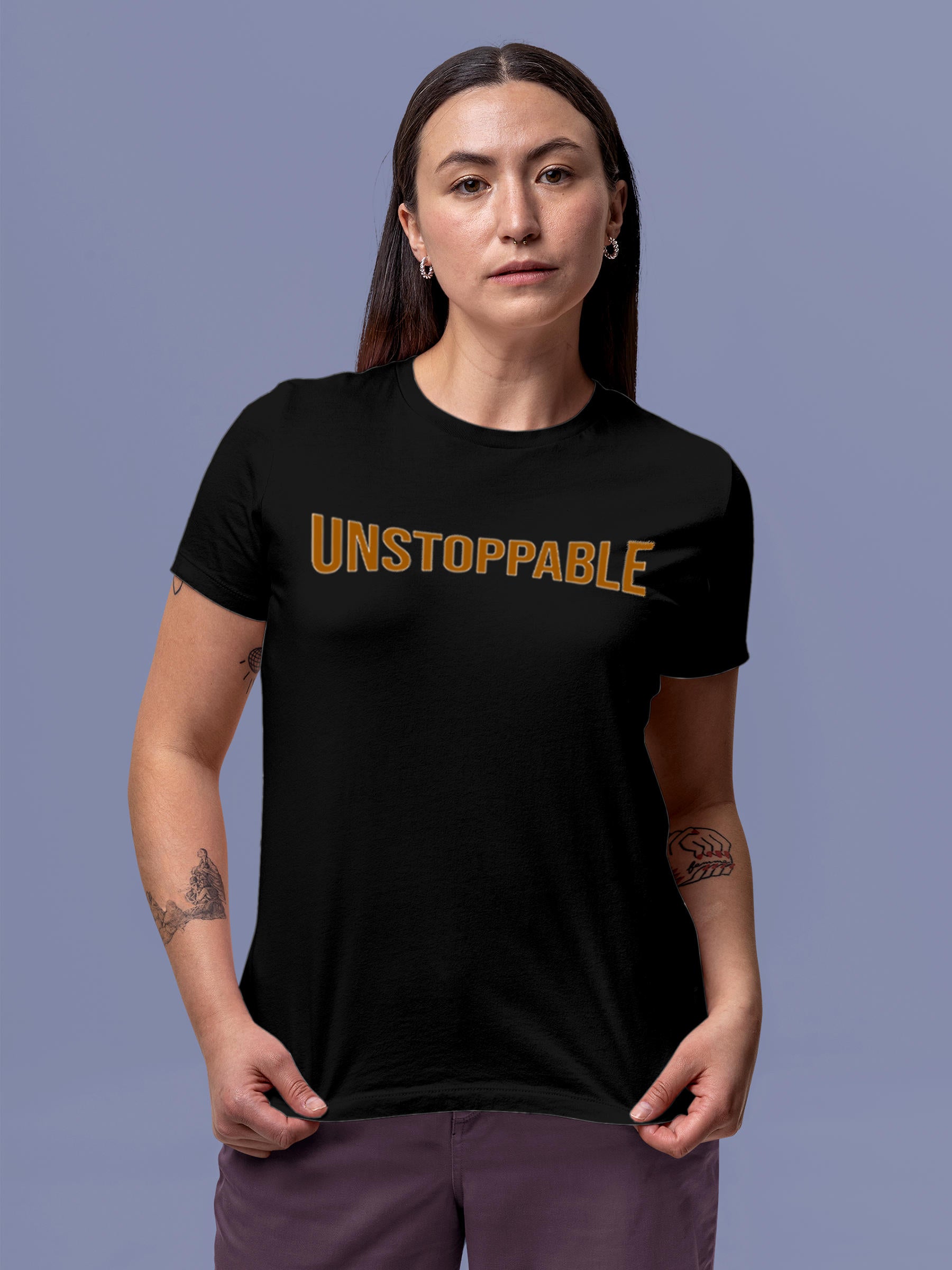 Model wearing Women's Black Round Neck T-shirt with 'Unstoppable' design, offering effortless style and premium comfort