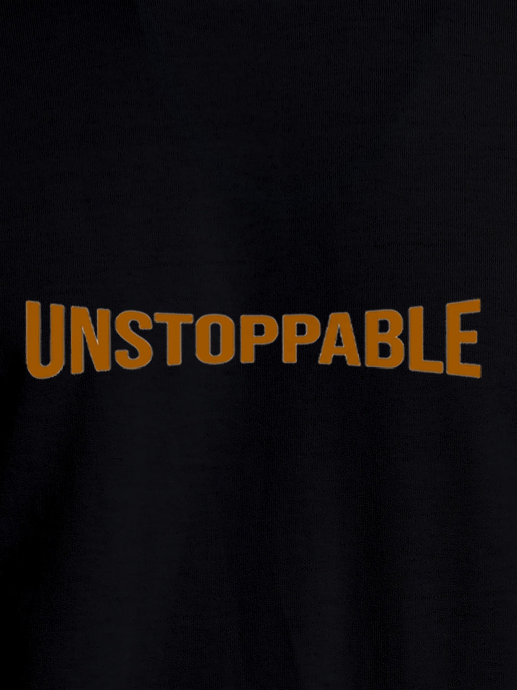 Close up of 'Unstoppable' design on Women's Black Round Neck T-shirt, highlighting intricate details and vibrant print.