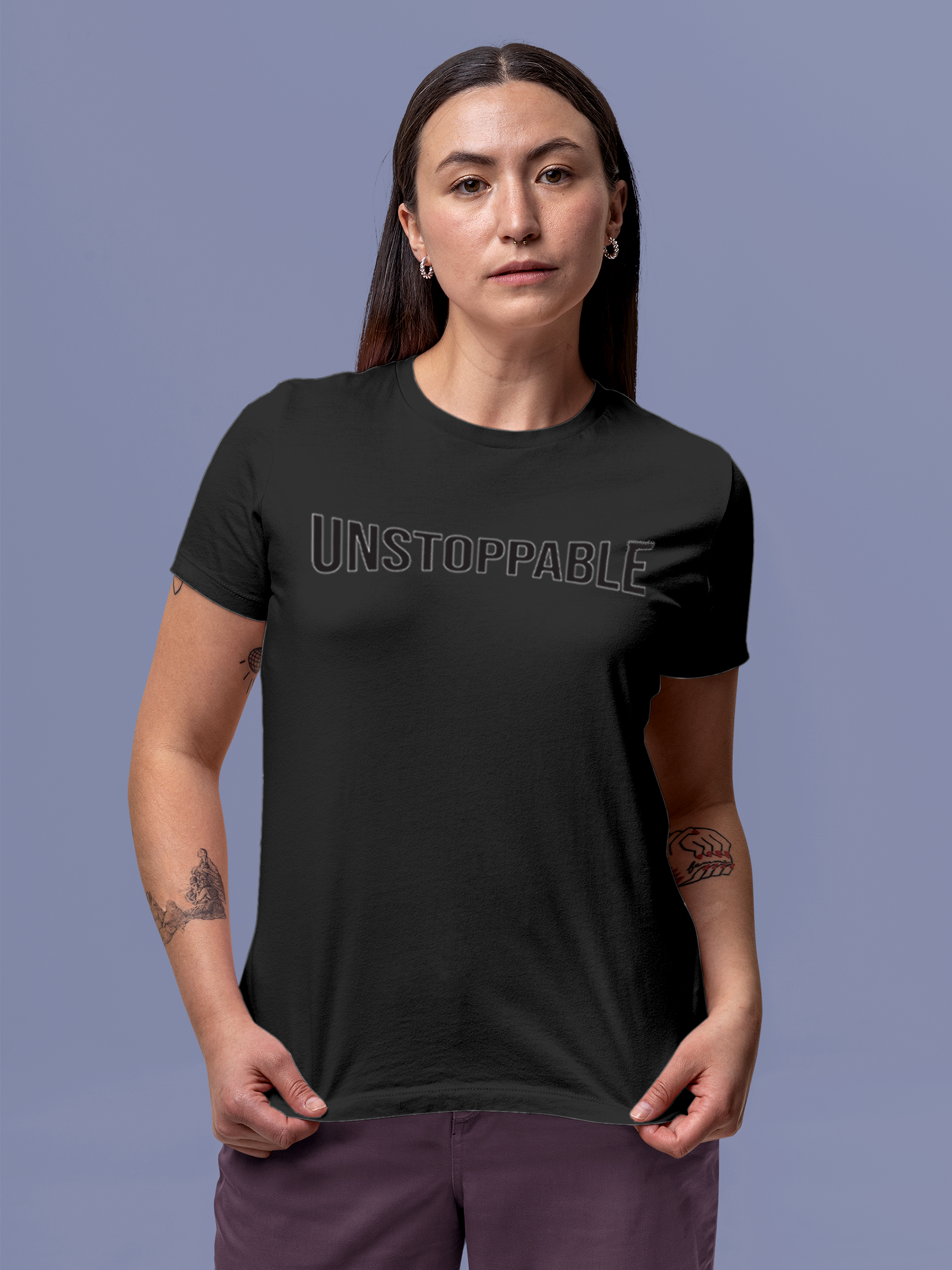 Model wearing Women's Dark Grey Round Neck T-shirt with 'Unstoppable' design, offering effortless style and premium comfort