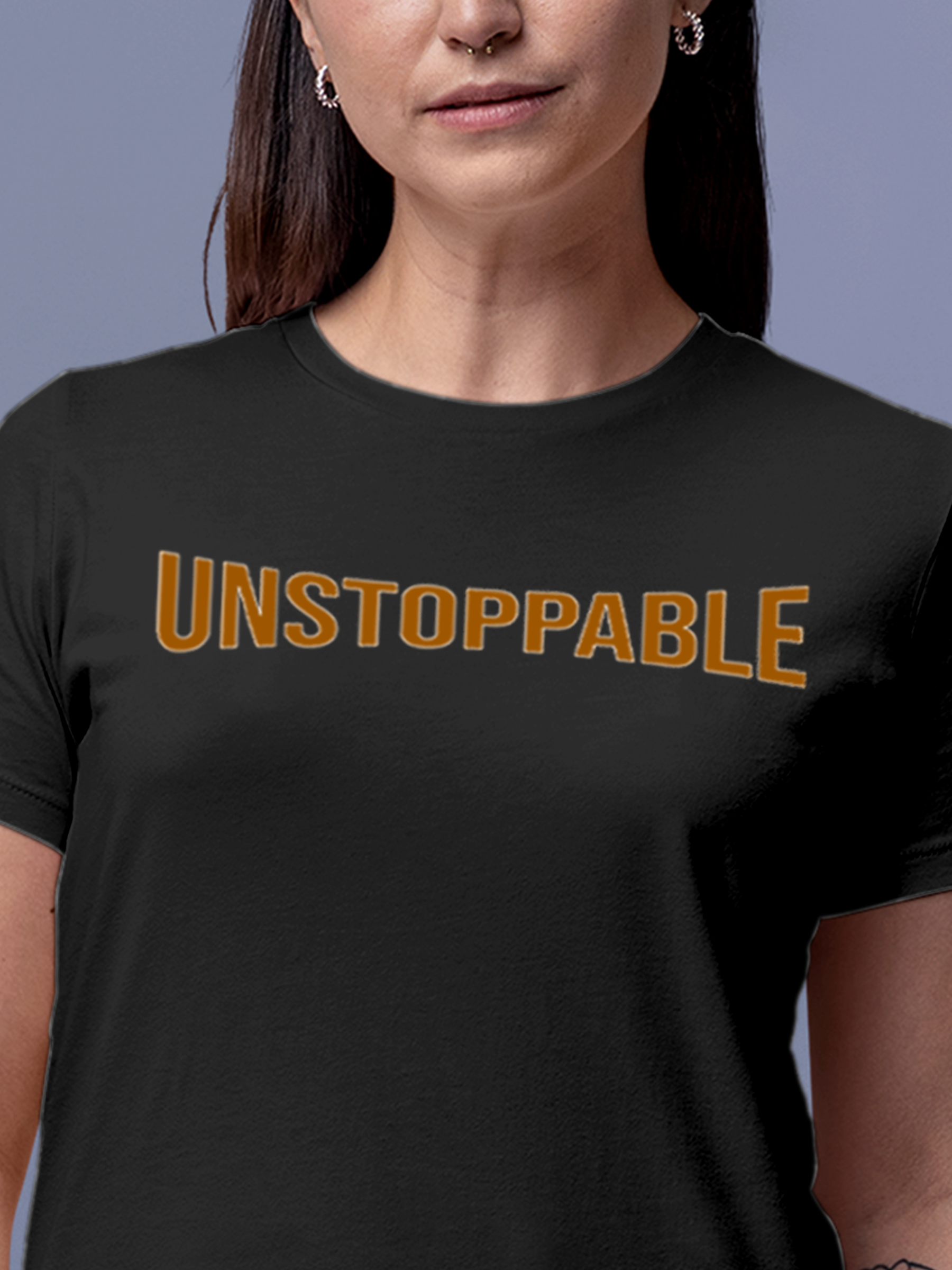 Close up of 'Unstoppable' design on Women's Dark Grey Round Neck T-shirt, highlighting intricate details and vibrant print.