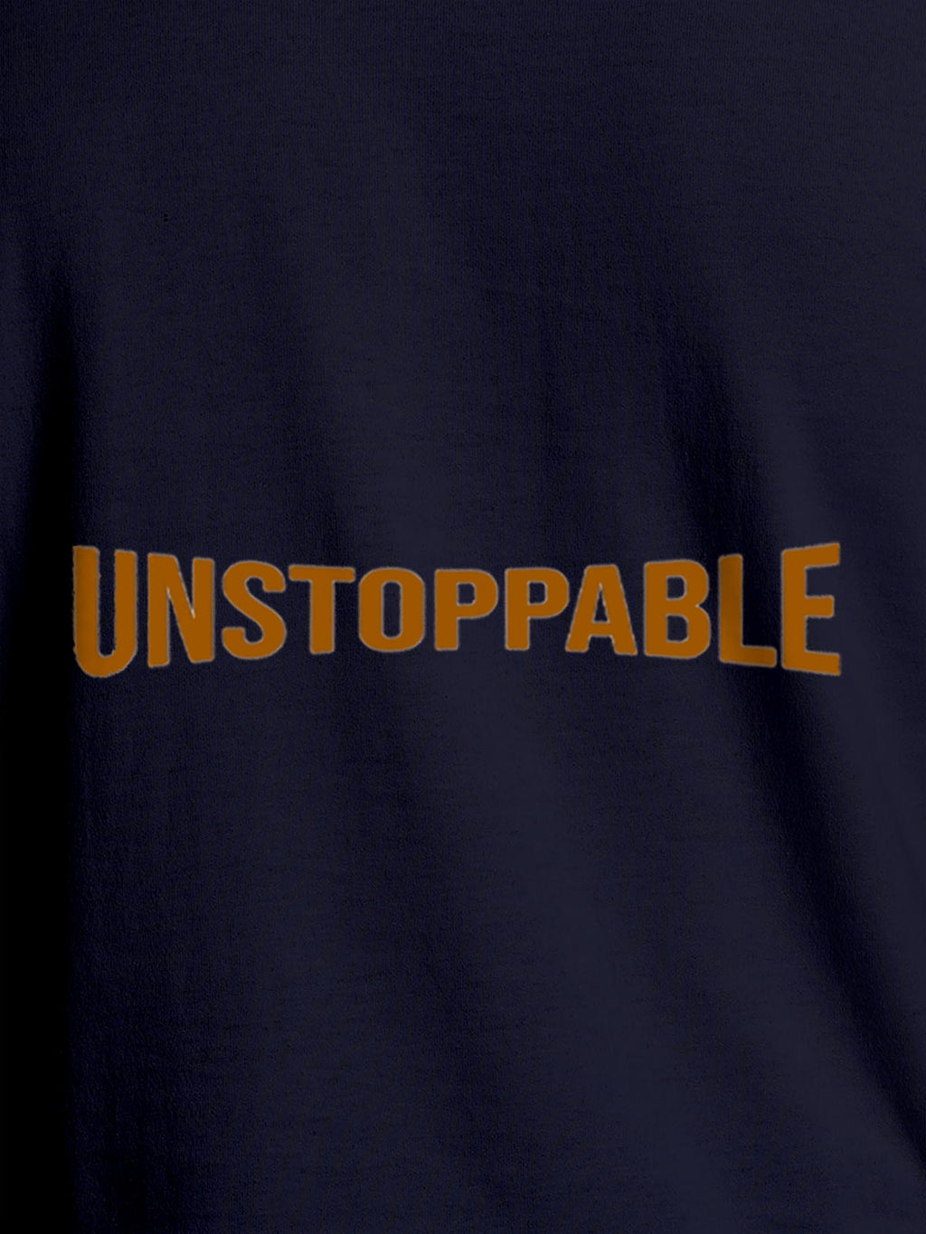 Close up of 'Unstoppable' design on Men's Navy Blue Round Neck T-shirt, highlighting intricate details and vibrant print.