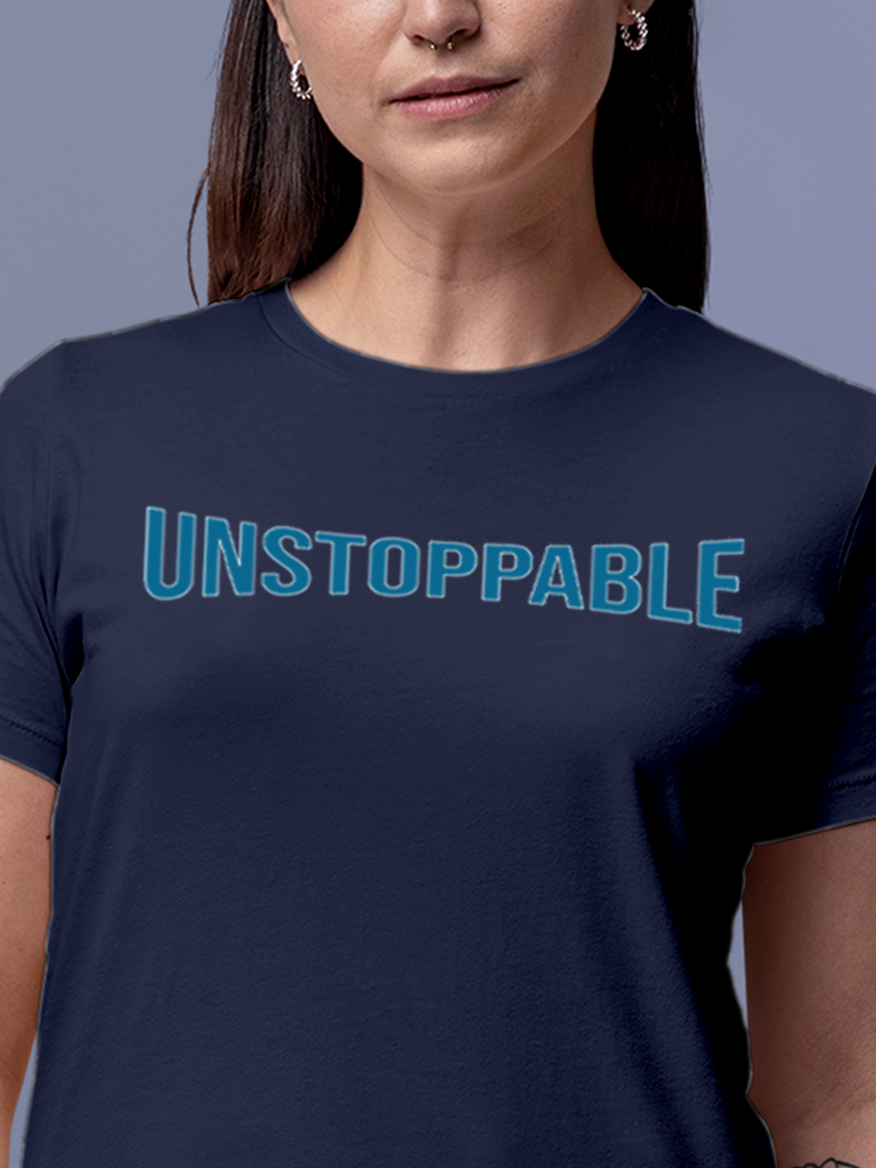 Close up of 'Unstoppable' design on Women's Navy Blue Round Neck T-shirt, highlighting intricate details and vibrant print.