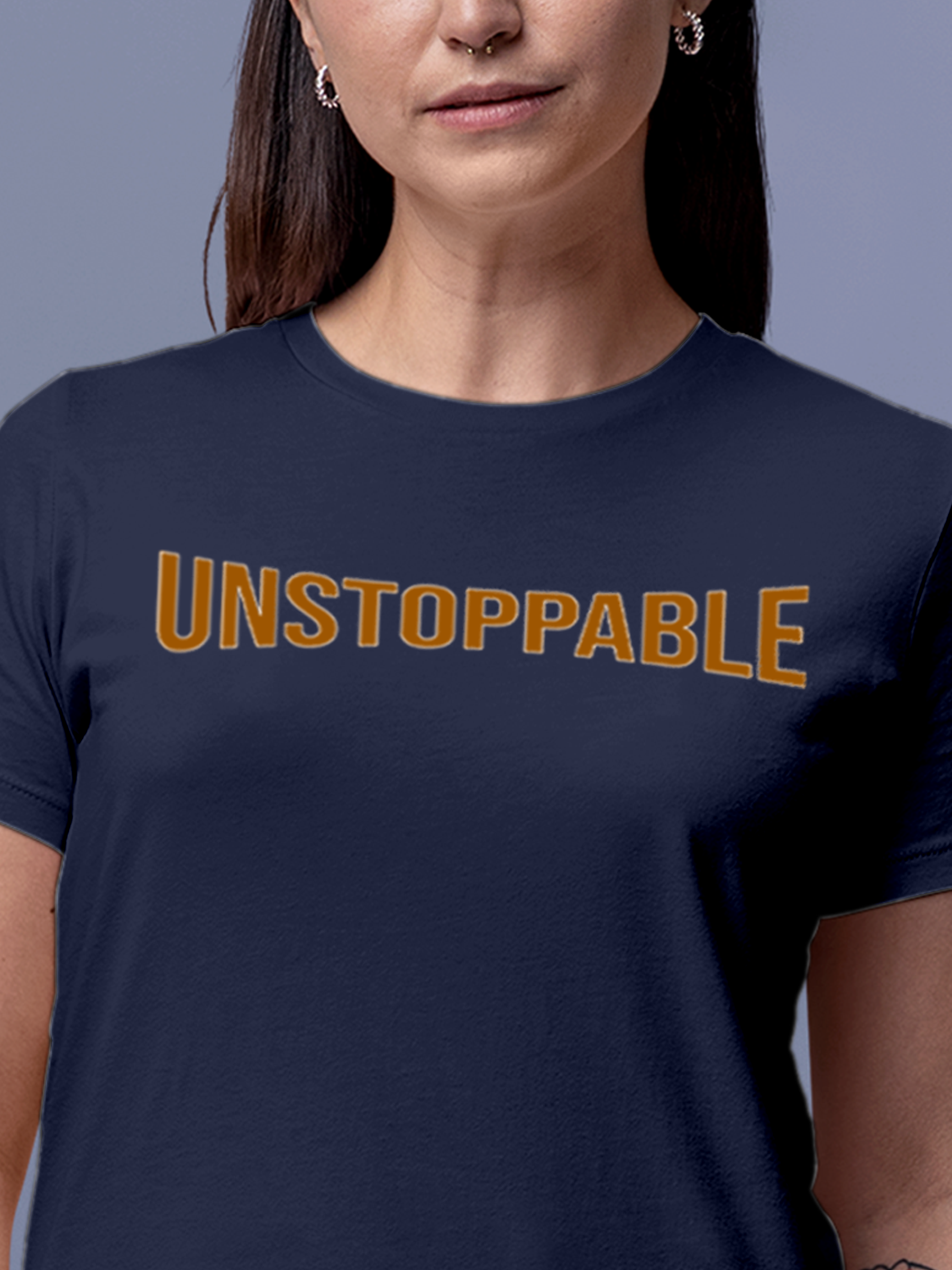 Close up of 'Unstoppable' design on Women's Navy Blue Round Neck T-shirt, highlighting intricate details and vibrant print.