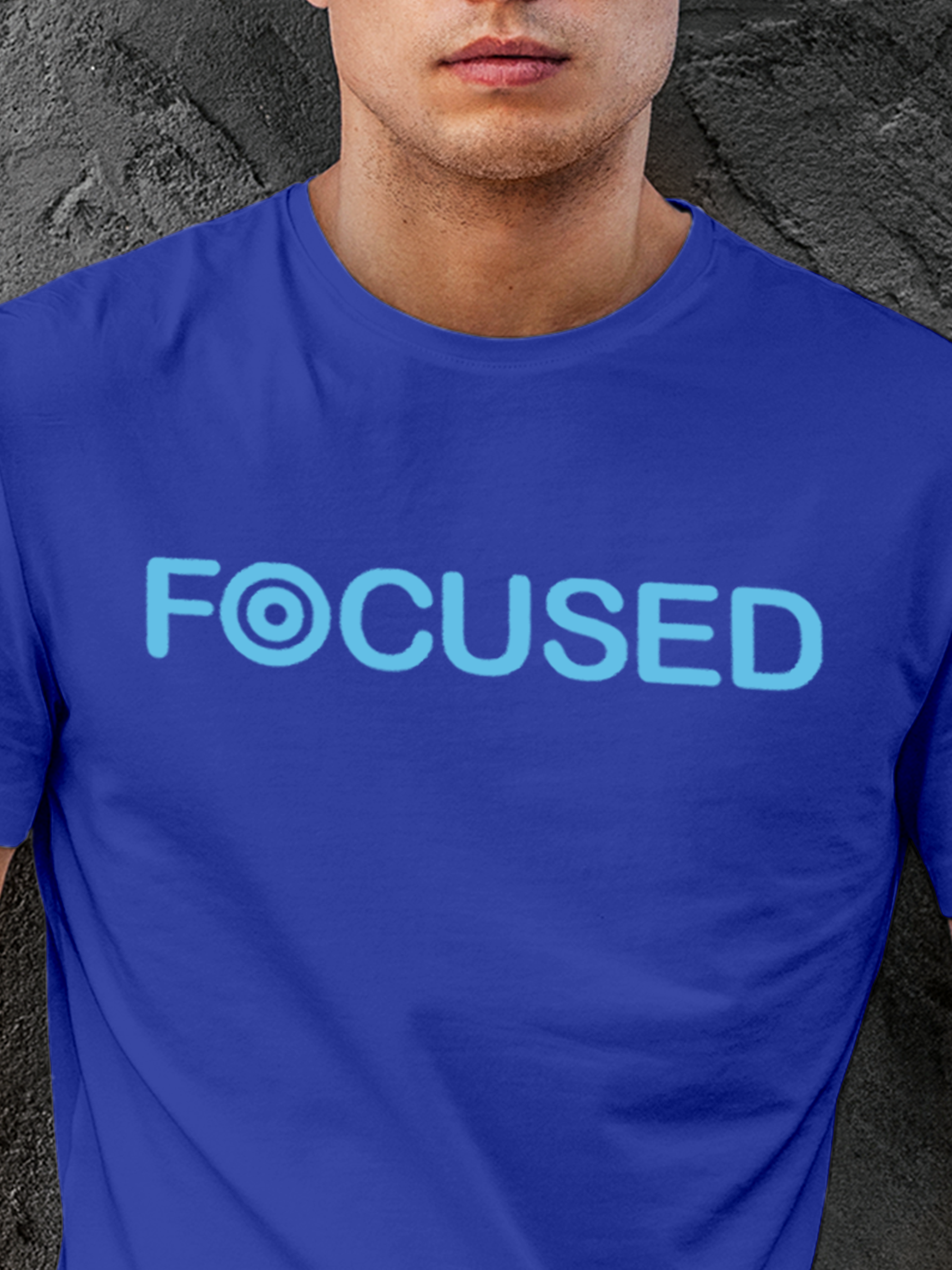 Close up of 'Focused' design on Men's Blue Round Neck T-shirt, highlighting intricate details and vibrant print.