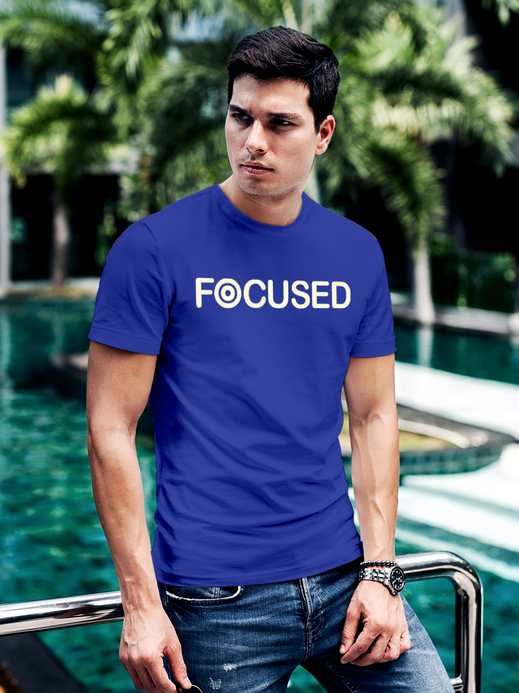 Model wearing Men's Blue Round Neck T-shirt with 'Focused' design, offering effortless style and premium comfort
