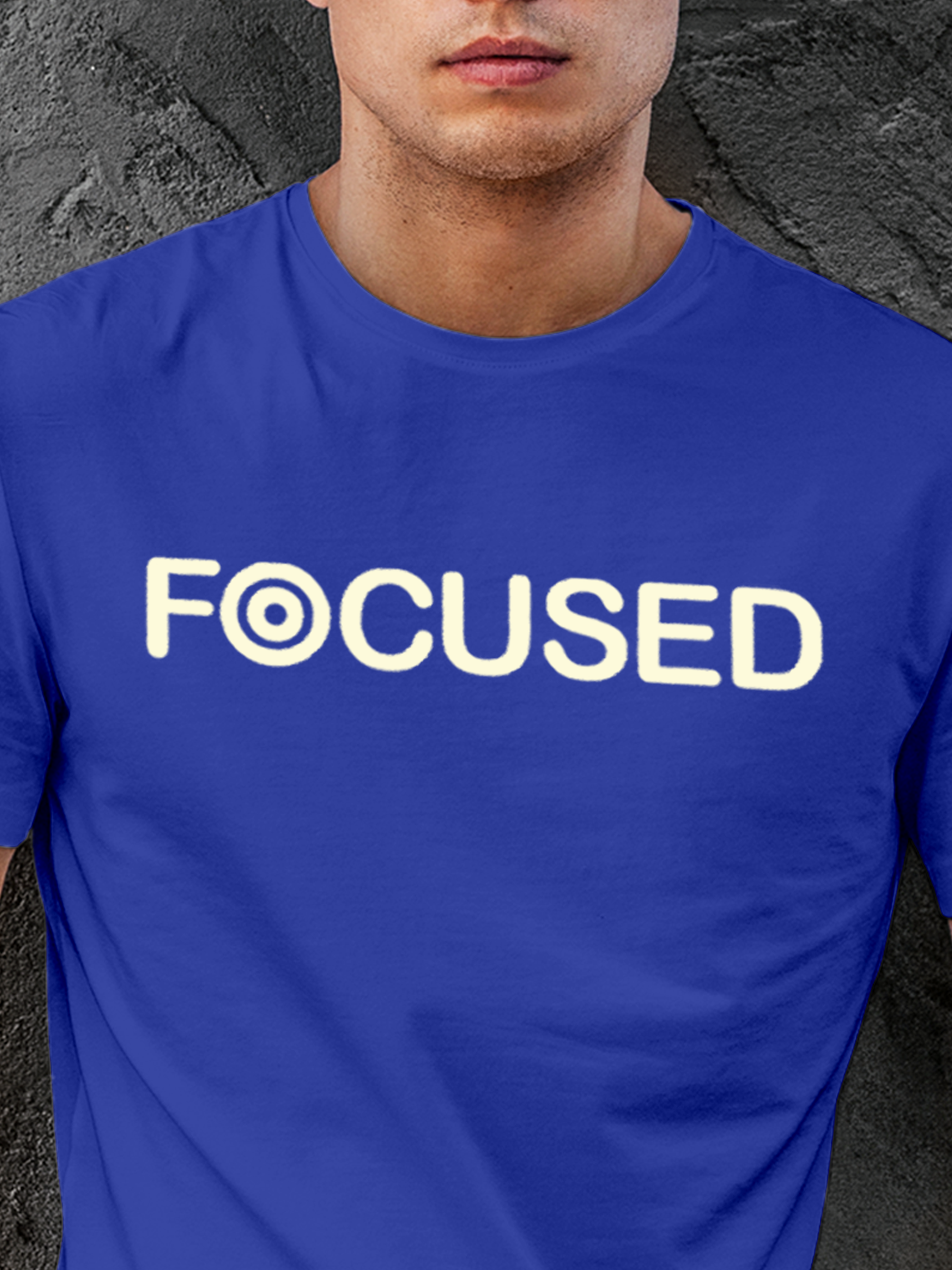 Close up of 'Focused' design on Men's Blue Round Neck T-shirt, highlighting intricate details and vibrant print.