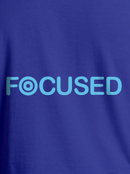 Close up of 'Focused' design on Women's Blue Round Neck T-shirt, highlighting intricate details and vibrant print.