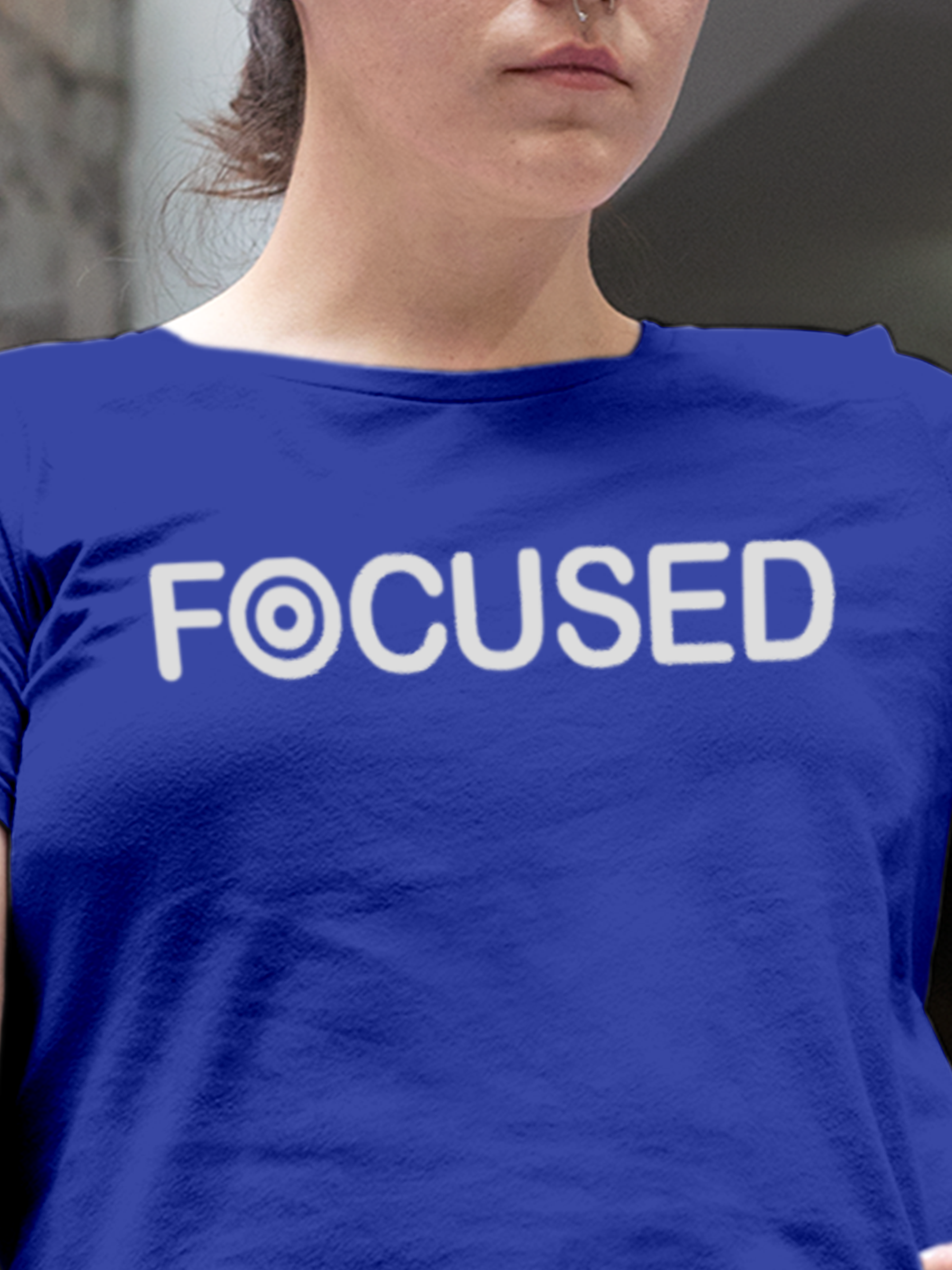 Close up of 'Focused' design on Women's Blue Round Neck T-shirt, highlighting intricate details and vibrant print.