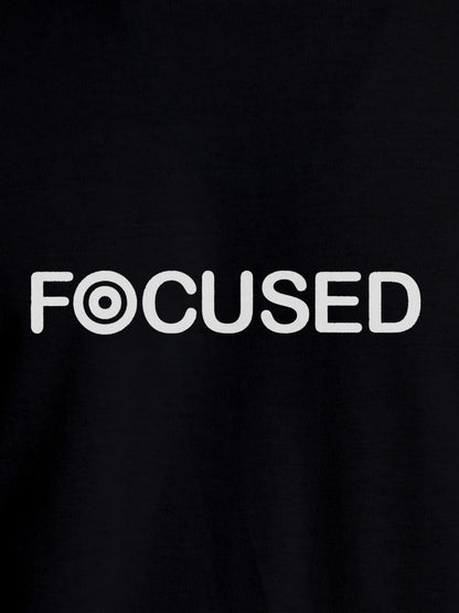 Close up of 'Focused' design on Men's Black Round Neck T-shirt, highlighting intricate details and vibrant print.