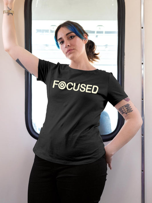 Model wearing Women's Dark Grey Round Neck T-shirt with 'Focused' design, offering effortless style and premium comfort