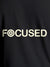 Close up of 'Focused' design on Women's Dark Grey Round Neck T-shirt, highlighting intricate details and vibrant print.