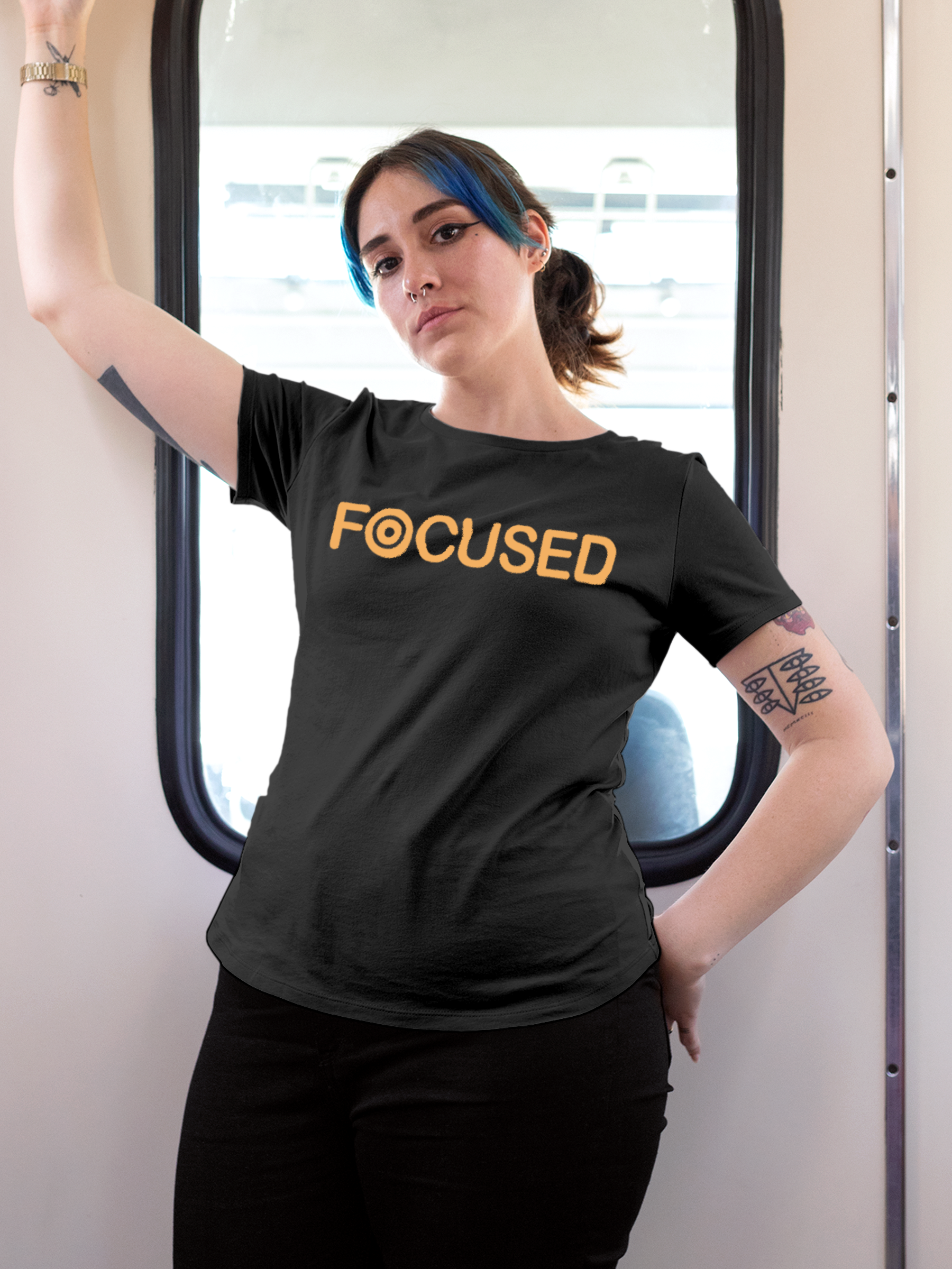 Model wearing Women's Dark Grey Round Neck T-shirt with 'Focused' design, offering effortless style and premium comfort