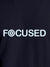 Close up of 'Focused' design on Men's Navy Blue Round Neck T-shirt, highlighting intricate details and vibrant print.
