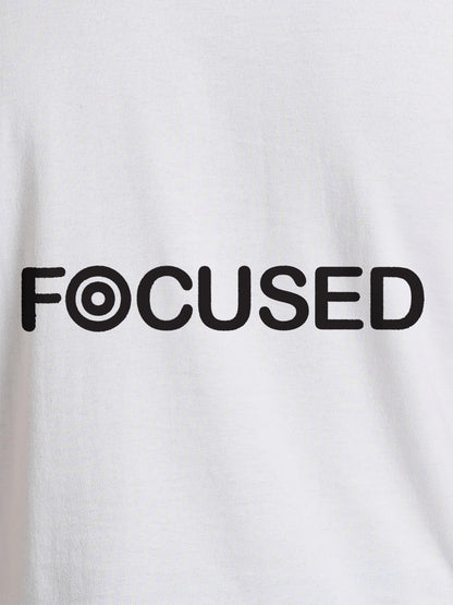 Close up of 'Focused' design on Women's White Round Neck T-shirt, highlighting intricate details and vibrant print.