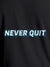 Close up of 'Never Quit' design on Women's Dark Grey Round Neck T-shirt, highlighting intricate details and vibrant print.