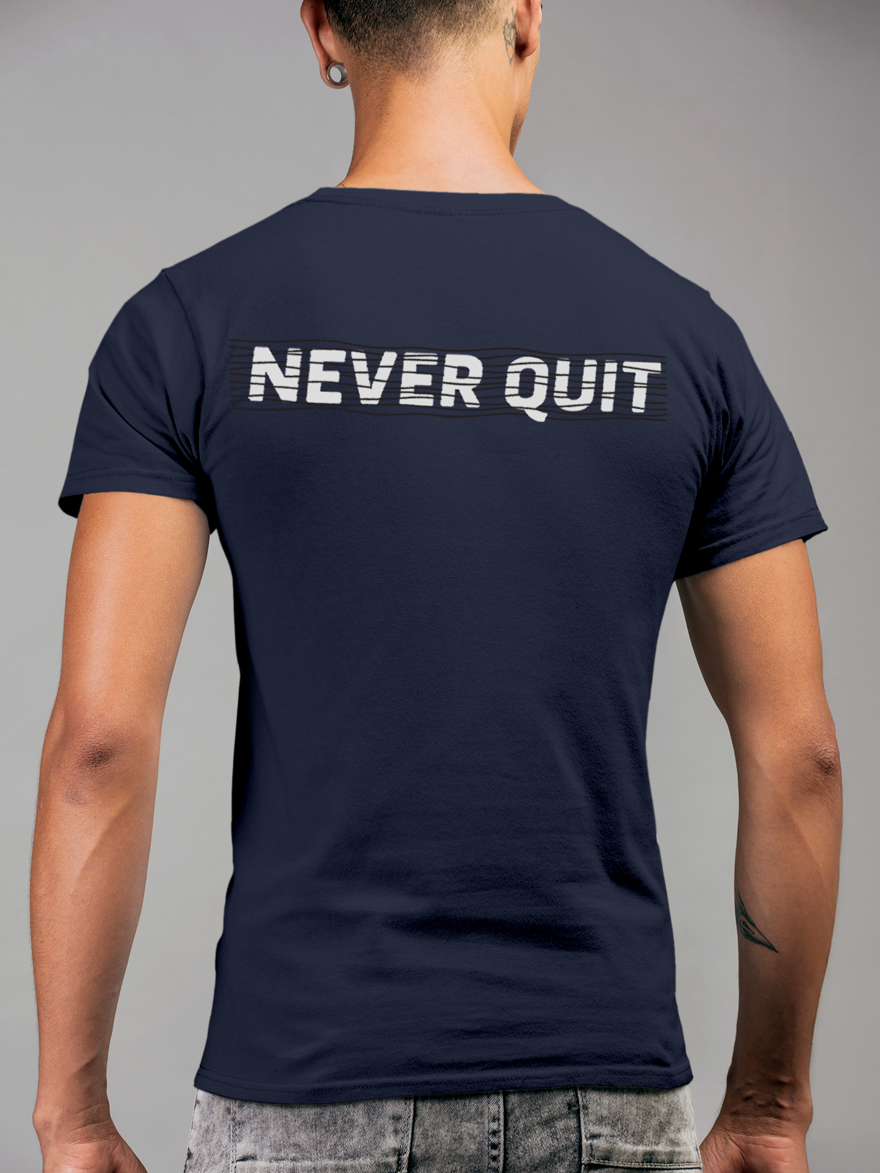 Model wearing Men's Navy Blue Round Neck T-shirt with 'Never Quit' design, offering effortless style and premium comfort