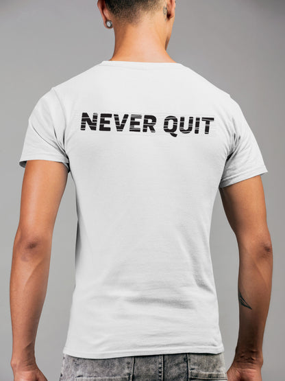 Model wearing Men's White Round Neck T-shirt with 'Never Quit' design, offering effortless style and premium comfort
