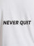 Close up of 'Never Quit' design on Women's White Round Neck T-shirt, highlighting intricate details and vibrant print.
