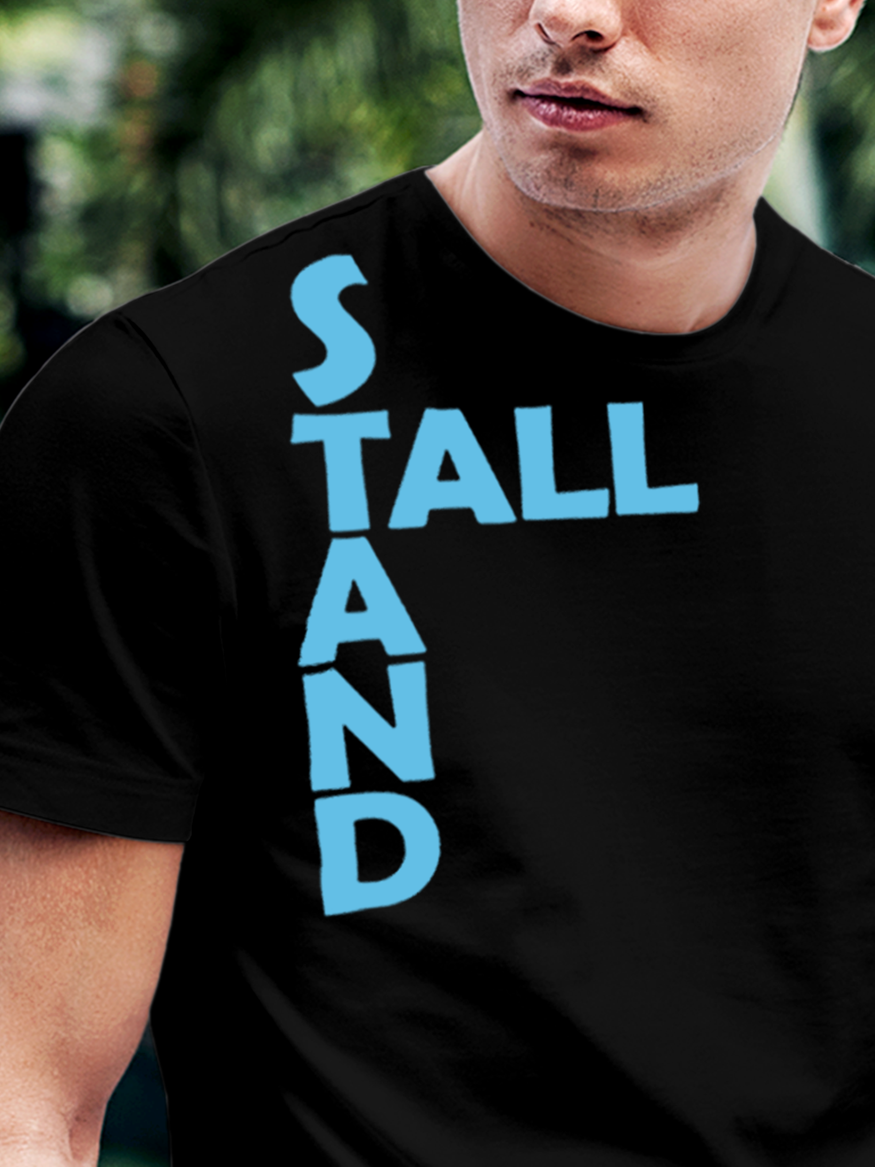 Close up of 'Stand Tall' design on Men's Black Round Neck T-shirt, highlighting intricate details and vibrant print.
