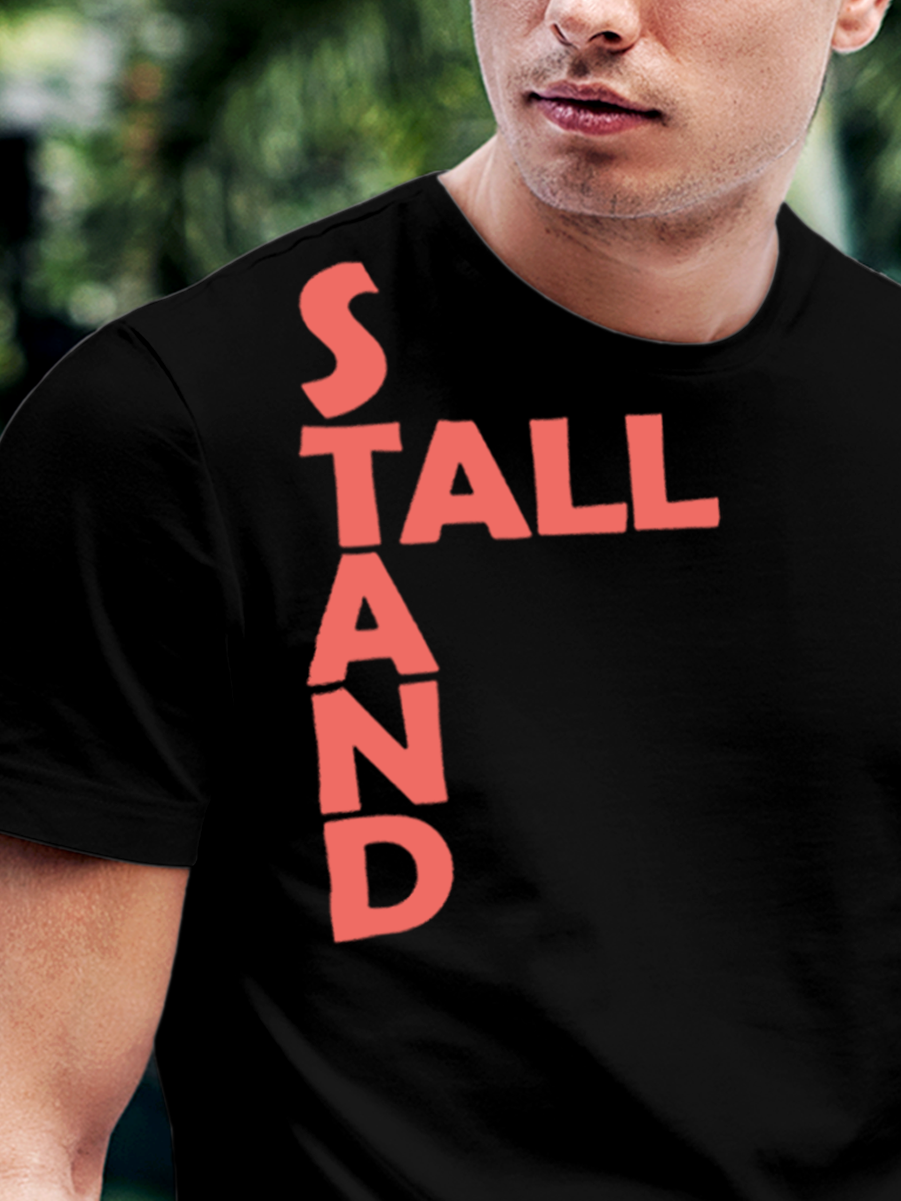 Close up of 'Stand Tall' design on Men's Black Round Neck T-shirt, highlighting intricate details and vibrant print.