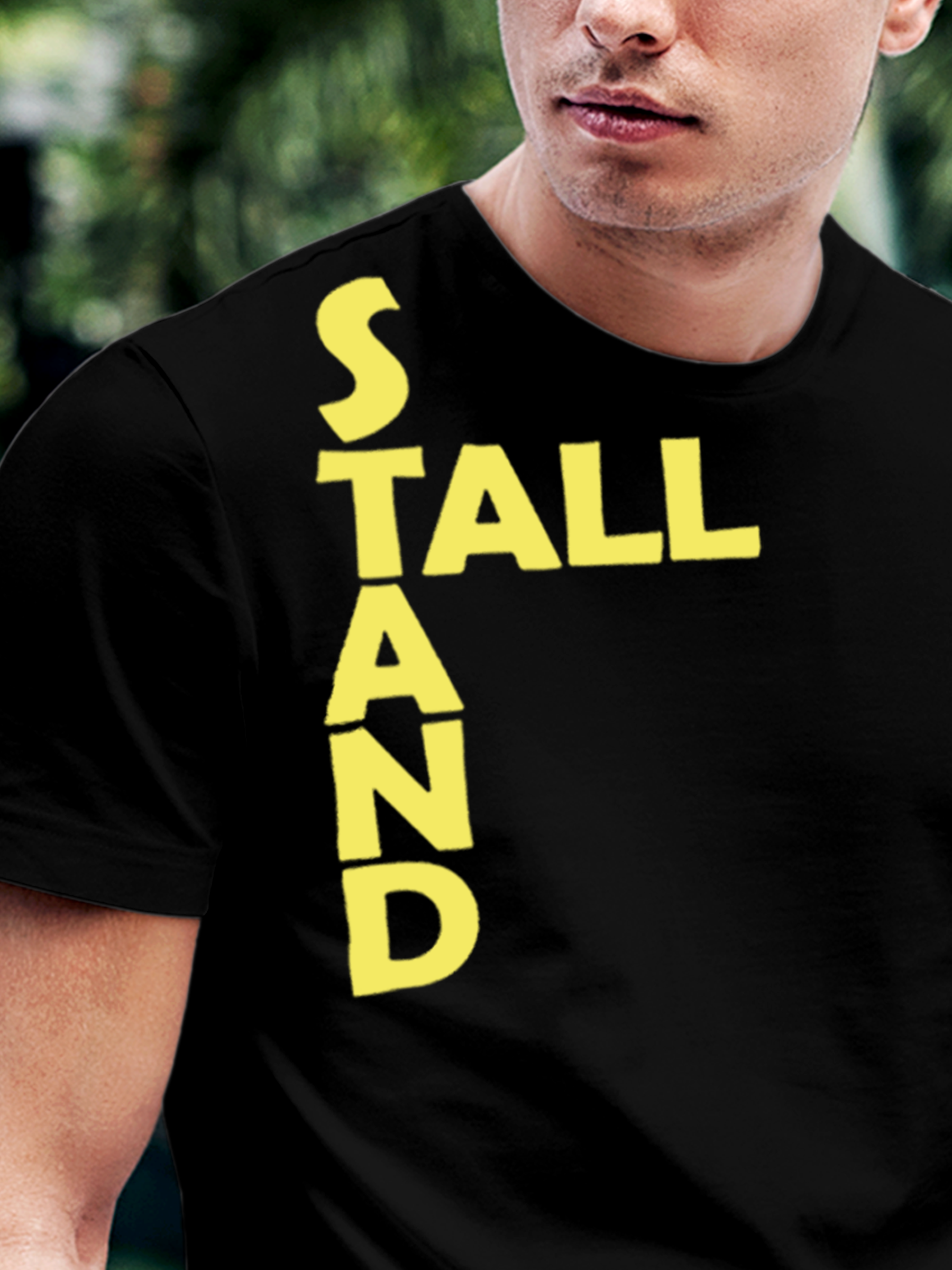Close up of 'Stand Tall' design on Men's Black Round Neck T-shirt, highlighting intricate details and vibrant print.