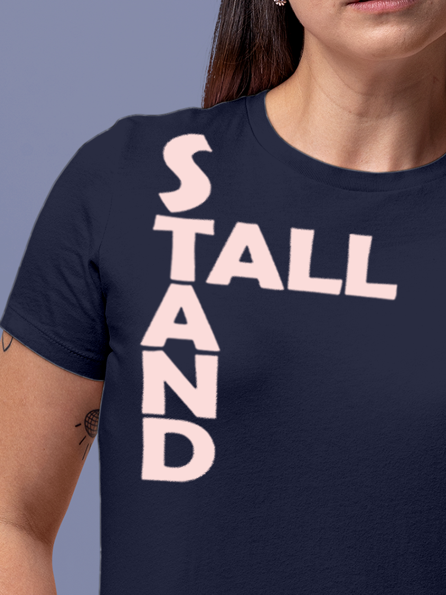 Close up of 'Stand Tall' design on Women's Navy Blue Round Neck T-shirt, highlighting intricate details and vibrant print.