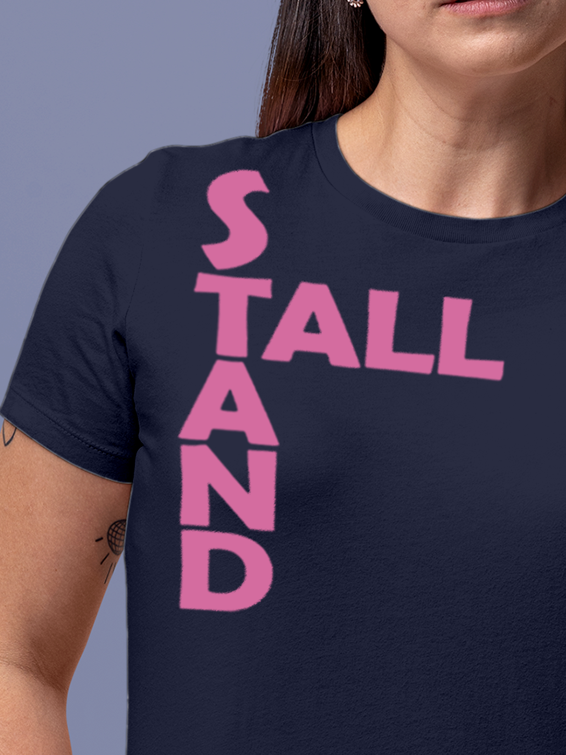 Close up of 'Stand Tall' design on Women's Navy Blue Round Neck T-shirt, highlighting intricate details and vibrant print.