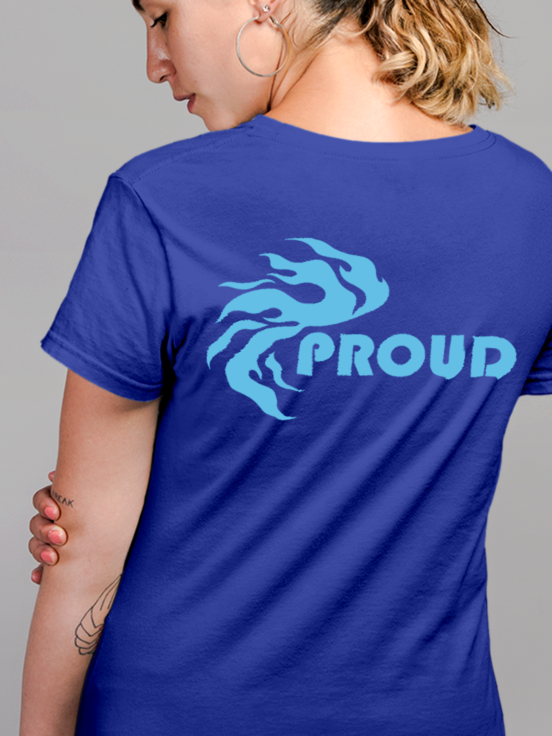 Close up of 'Proud' design on Women's Blue Round Neck T-shirt, highlighting intricate details and vibrant print.