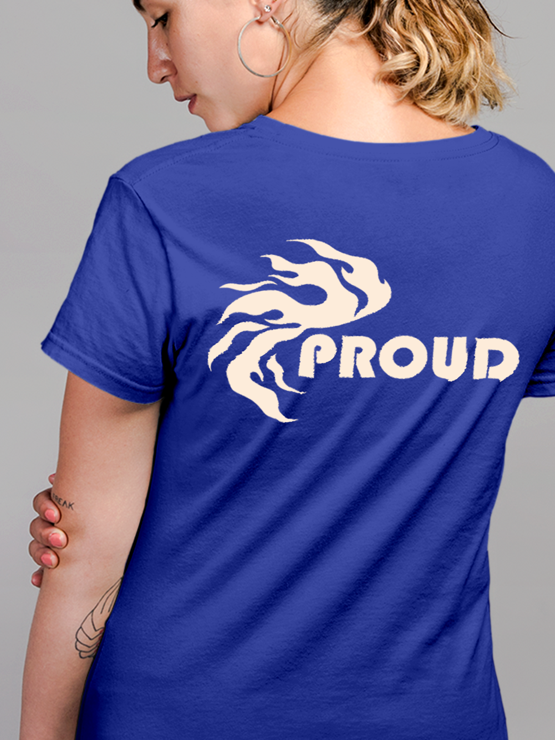 Close up of 'Proud' design on Women's Blue Round Neck T-shirt, highlighting intricate details and vibrant print.
